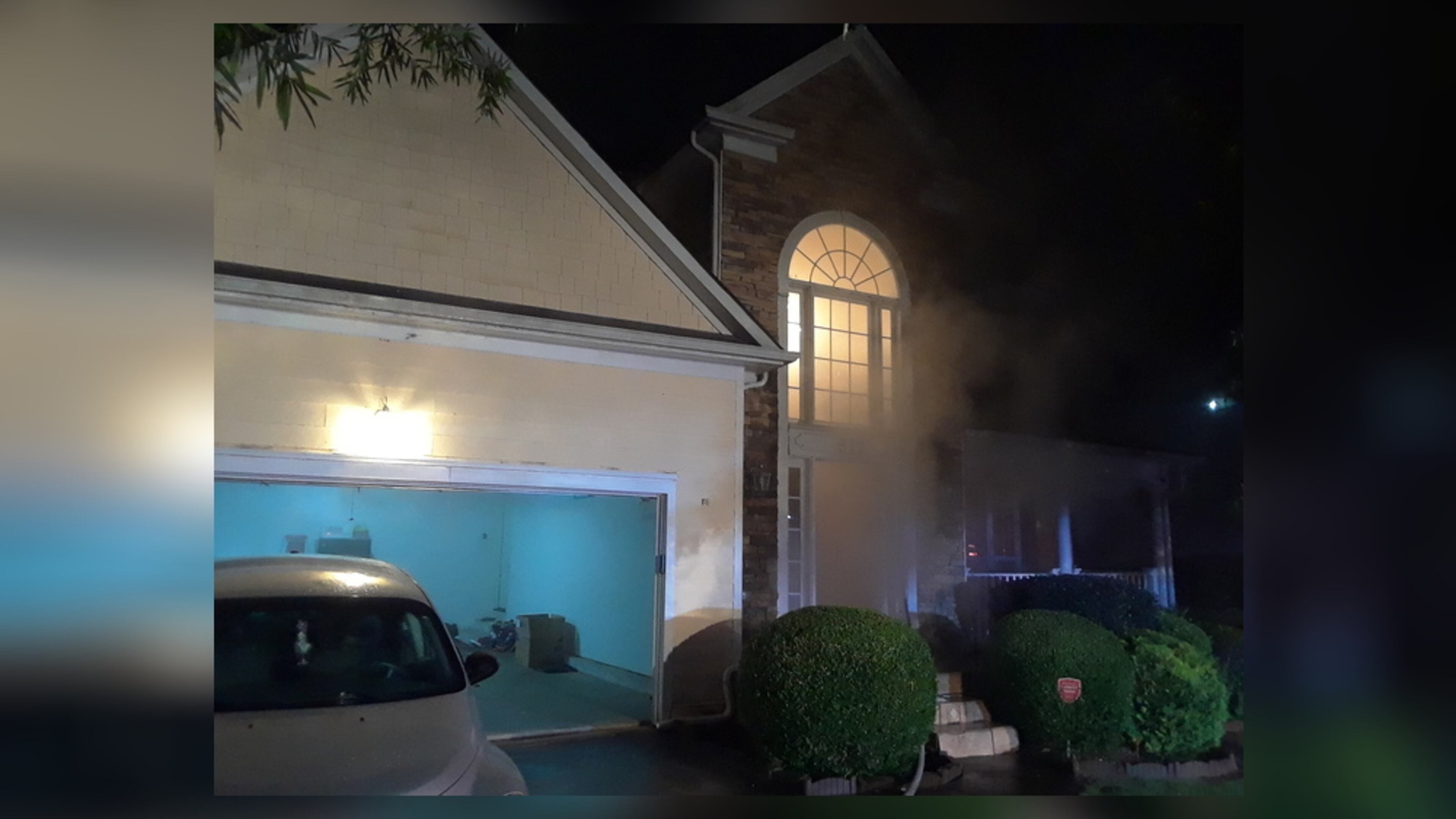 Seven people were displaced when lightning sparked a fire at a home in unincorporated Lawrenceville on Saturday morning, authorities said.