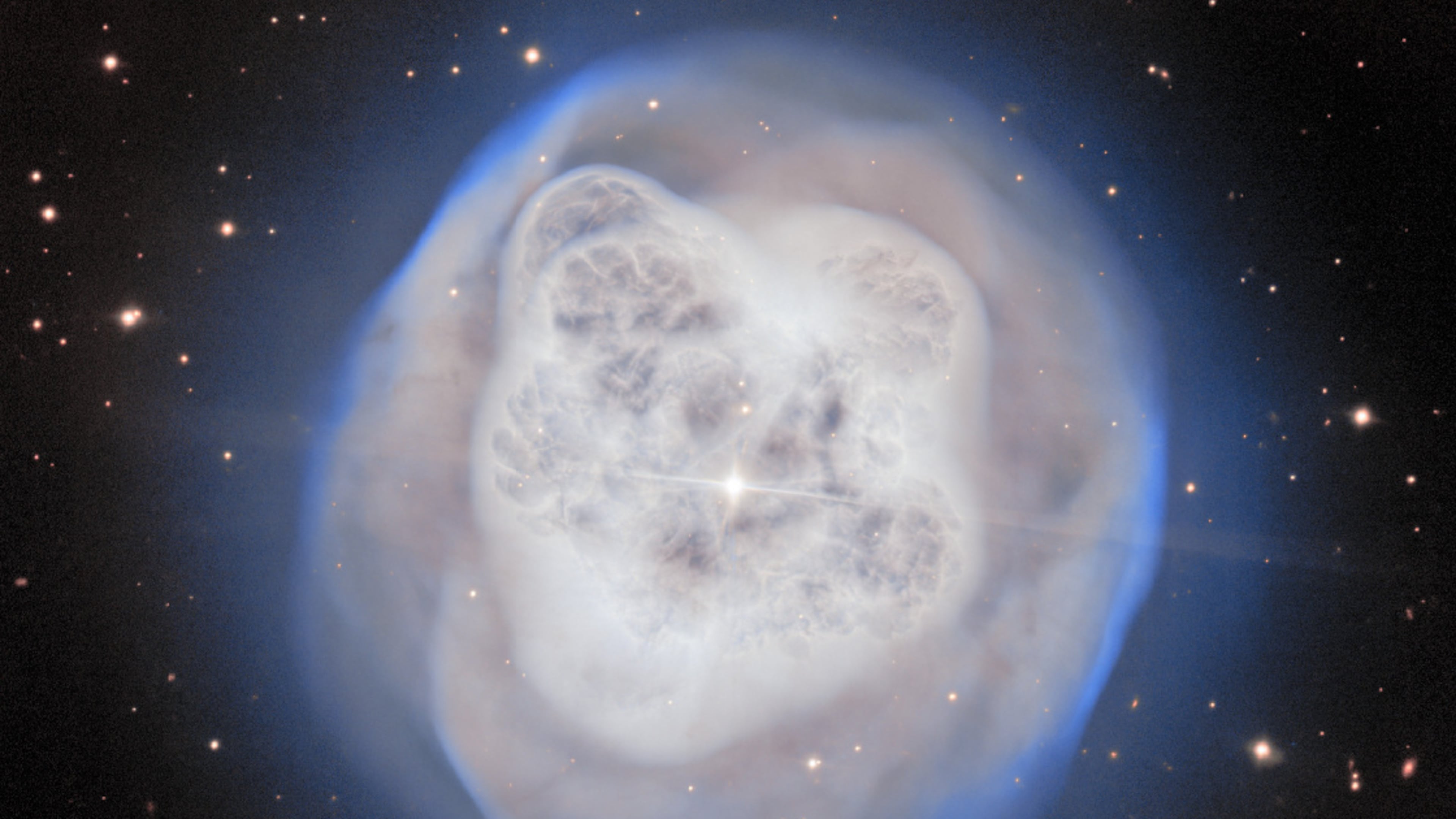 This image provided by the U.S. National Science Foundation’s NOIRLab on Thursday, May 21, 2026, shows the Crystal Ball Nebula. (NSF NOIRLab via AP)
