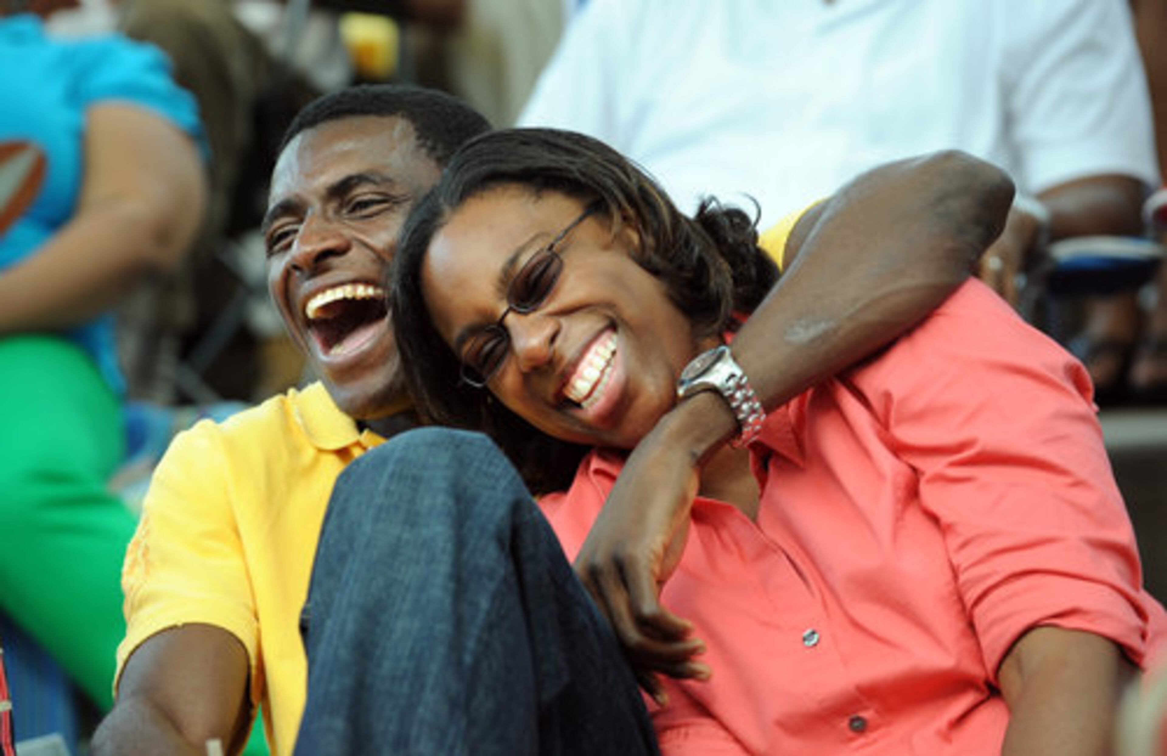 CONCERT GOERS Thierry Betole and his girlfriend, Anita Johnson, have a laugh. The free concert series has been taking place for more than a decade.