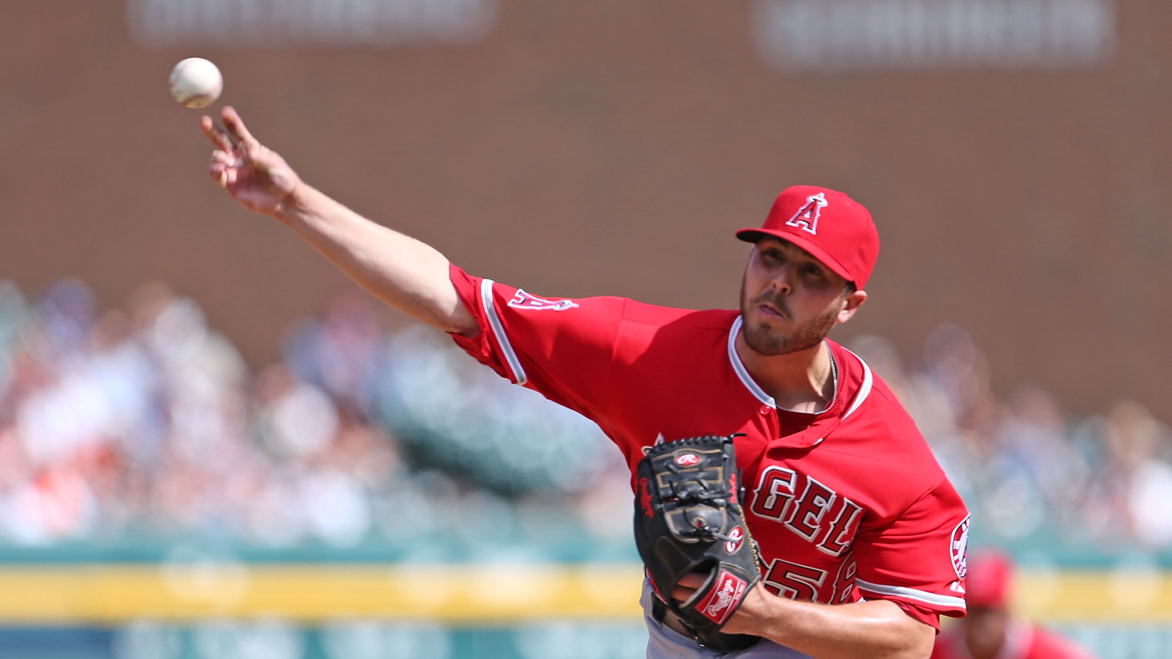 Michael Kohn #58 of the Los Angeles Angels of Anaheim pitches in the eight inning of the game against the Detroit Tigers at Comerica Park on April 20, 2014 in Detroit, Michigan. (Photo by Leon Halip/Getty Images)