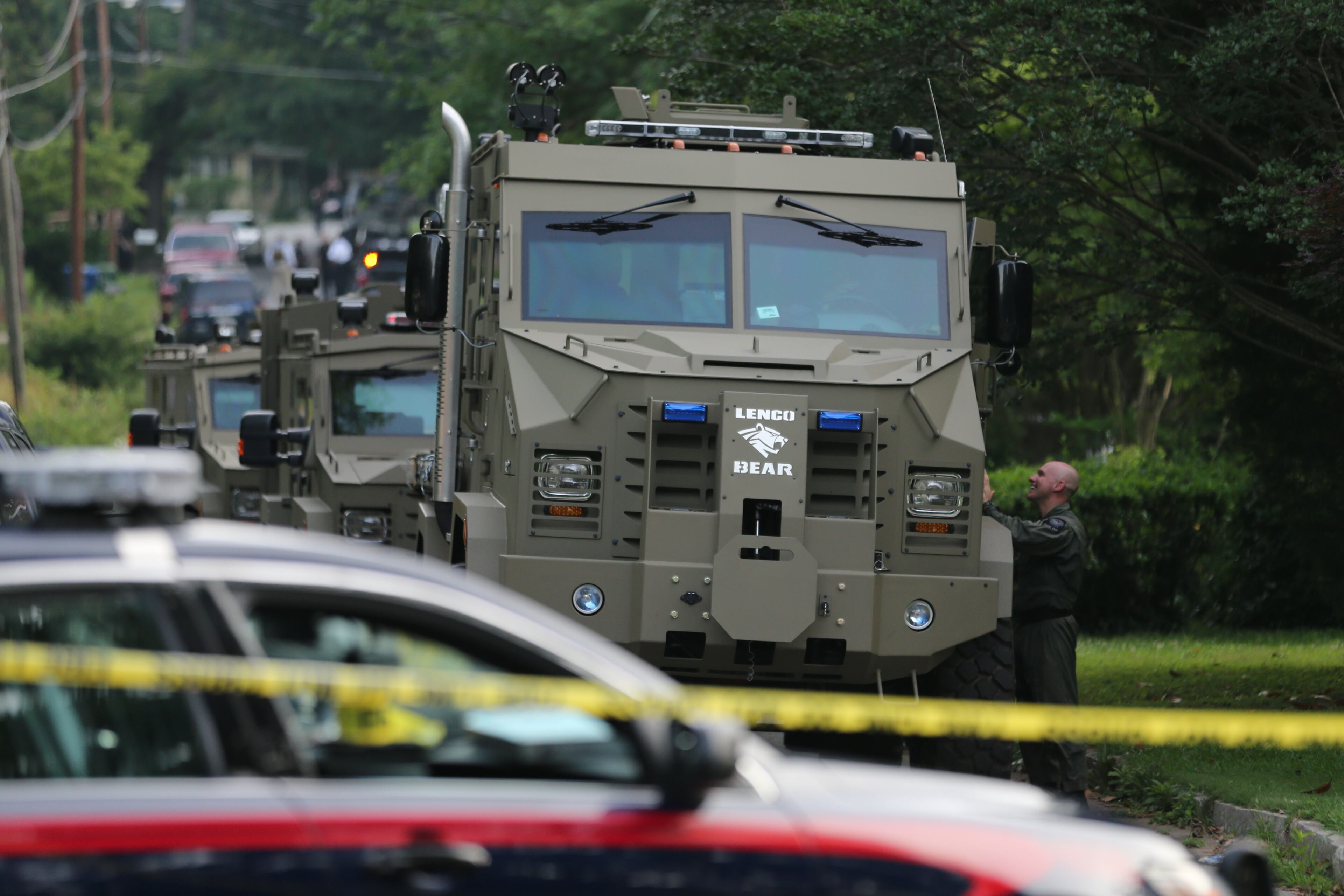 The incident began around 1:30 a.m. with reports of a man pulling a gun on a woman at a home in the 2400 block of Baxter Street. JOHN SPINK/JOHNSPINK@AJC.COM