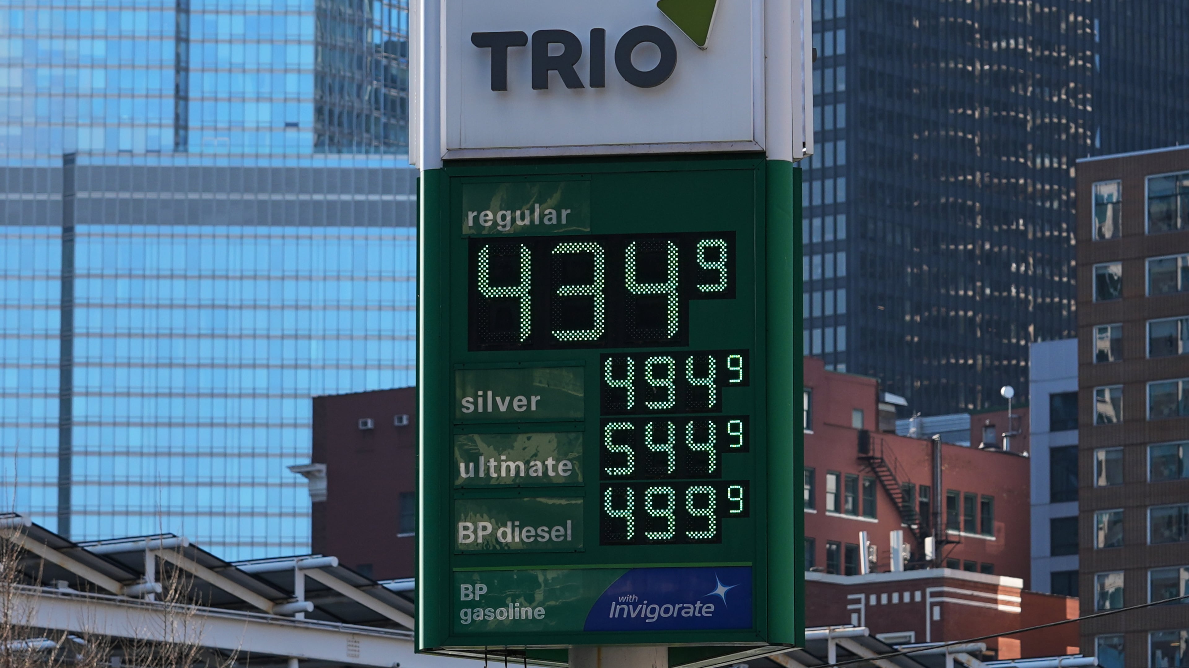 Prices are displayed at a gas station in Chicago, Monday, April 6, 2026. (AP Photo/Nam Y. Huh)