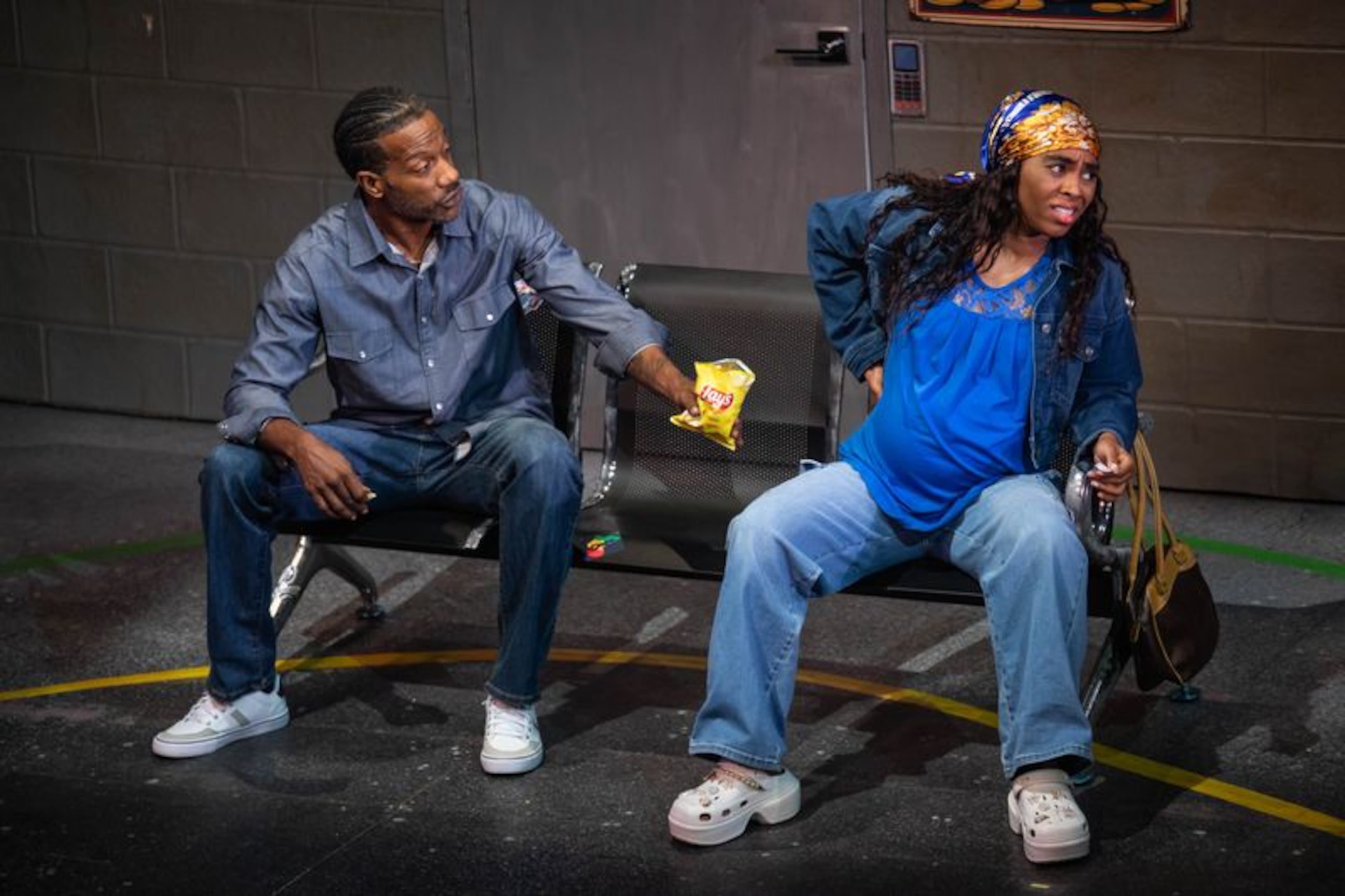 Jay Jones (left) and Tequilla Whitfield, along with other cast members, deliver in a play that suggests no one is coming to save the community. (Courtesy of Casey Gardner Ford)
