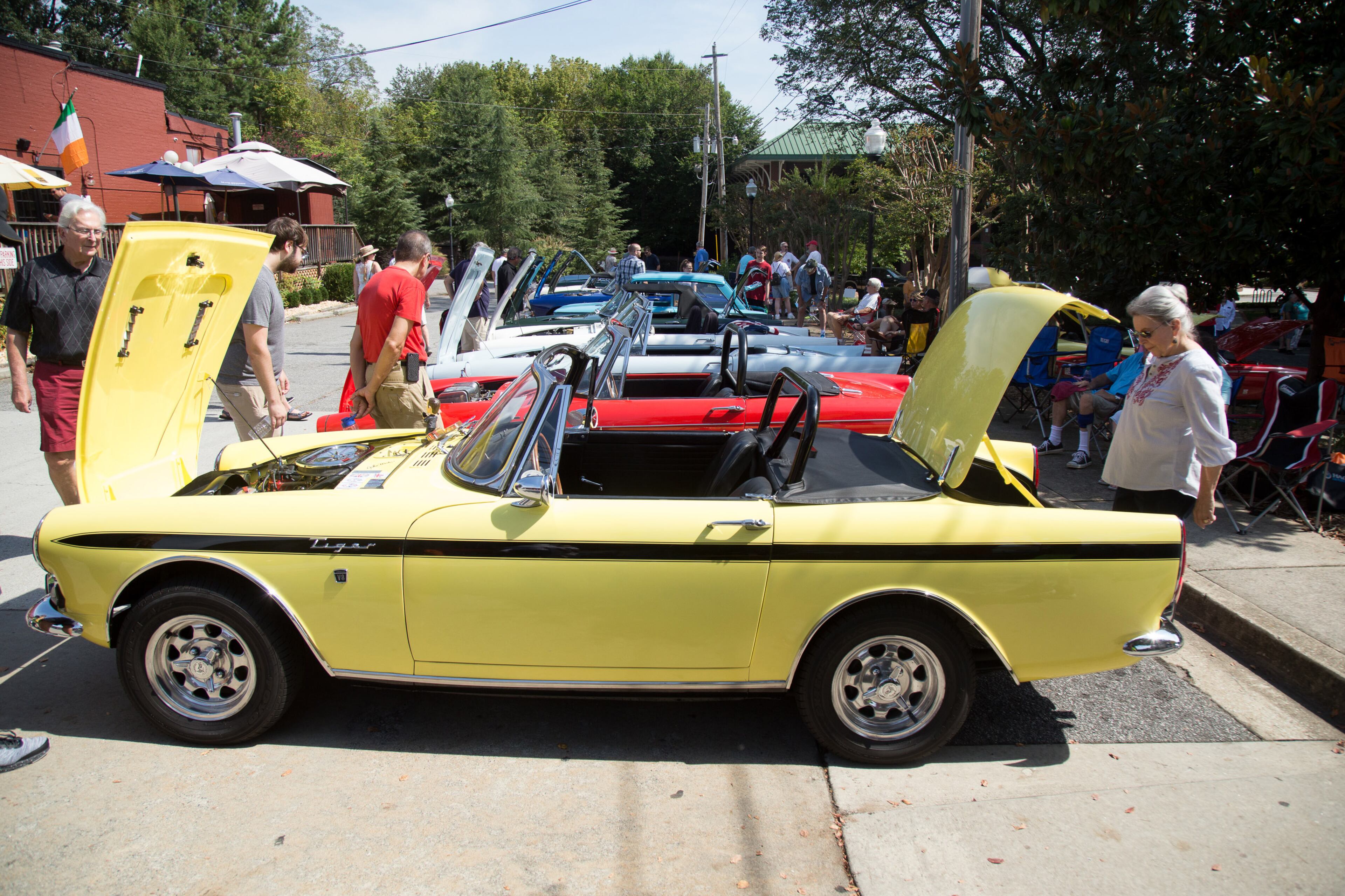 Joyce Clemens (right) looks over a 1967 Sunbeam Tiger during the 8th annual Atlanta British Car Fayre in downtown Norcross on Saturday, Sept. 8, 2018. The British Car Fayre featured more than 400 British automobiles and motorcycles. (Photo: STEVE SCHAEFER / SPECIAL TO THE AJC)