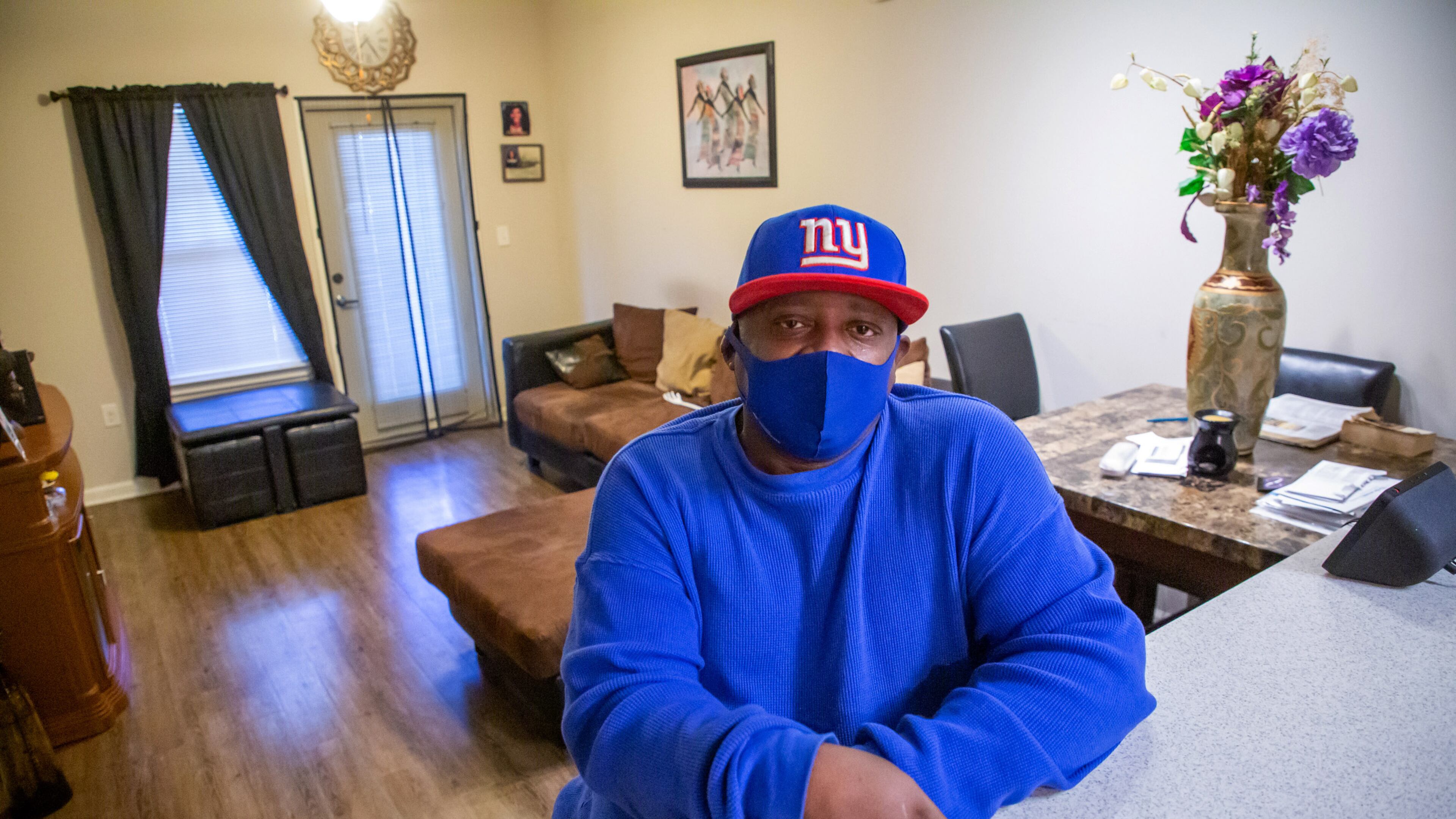 Kenneth Walker sits in his apartment at the Manor at Indian Creek in Stone Mountain Mondy, November 29, 2021. STEVE SCHAEFER FOR THE ATLANTA JOURNAL-CONSTITUTION