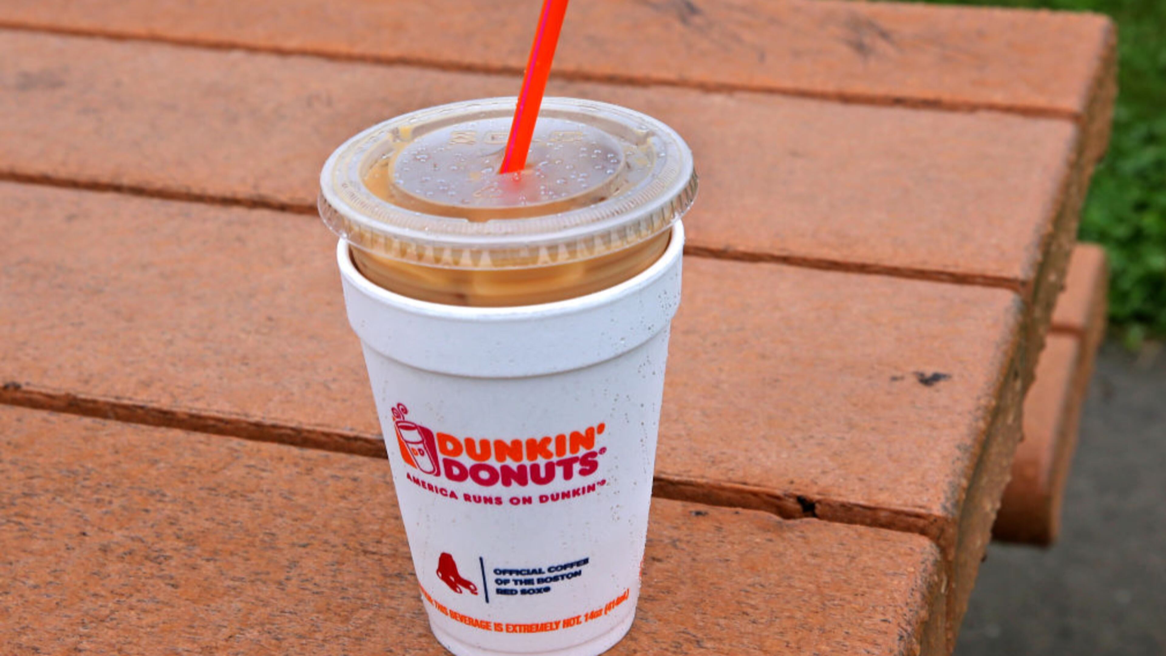 A Dunkin' Donuts iced coffee in Boston, July 13, 2017. (Photo by David L. Ryan/The Boston Globe via Getty Images)