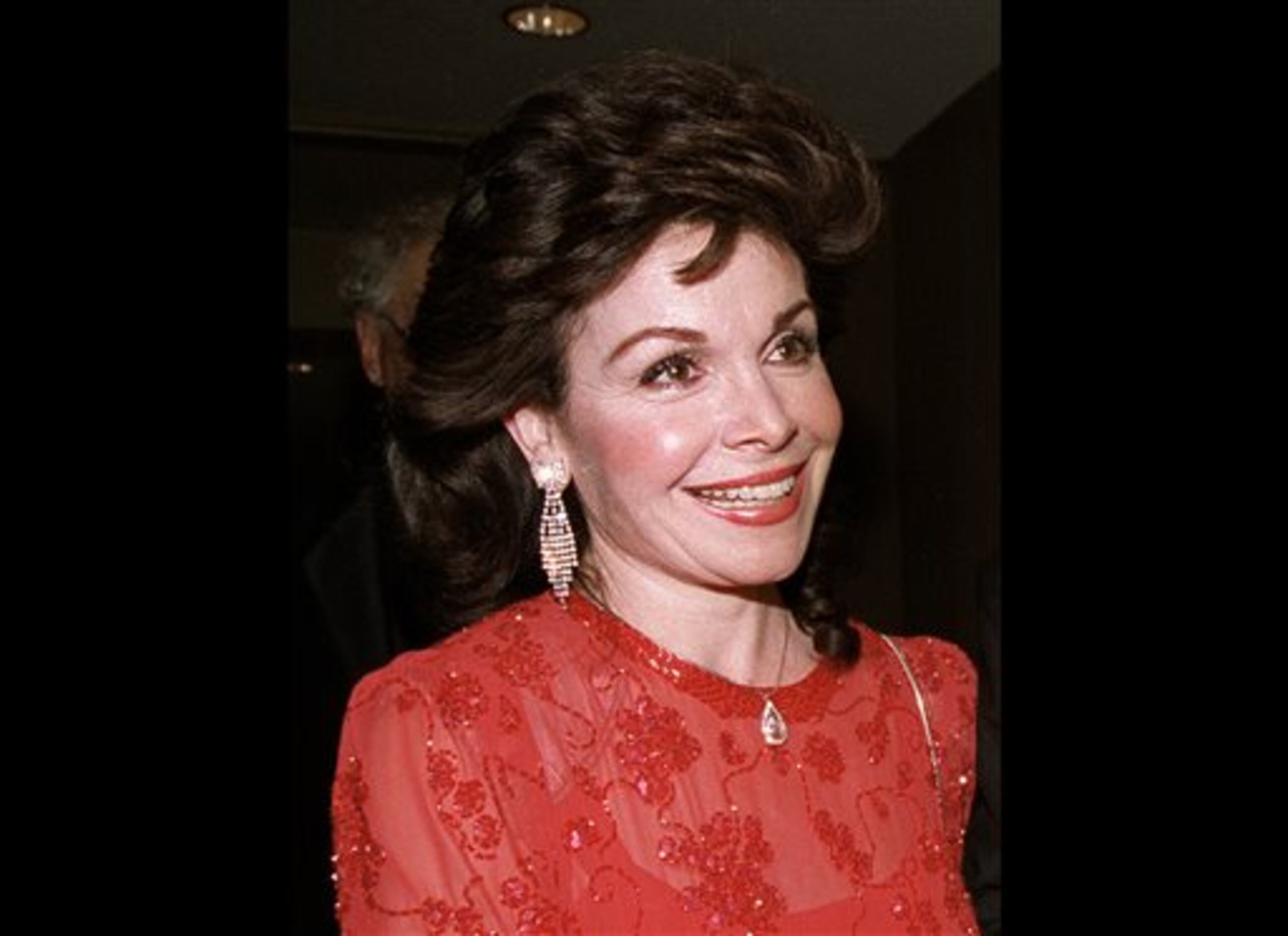 FILE - In this Oct. 20, 1990 file photo, actress and former Mickey Mouse Club member Annette Funicello arrives for the 15th annual Italian American Foundation dinner in Washington. Walt Disney Co. says, Monday, April 8, 2013, that Funicello, also known for her beach movies with Frankie Avalon, has died at age 70. (AP Photo/J. Scott Applewhite, File)