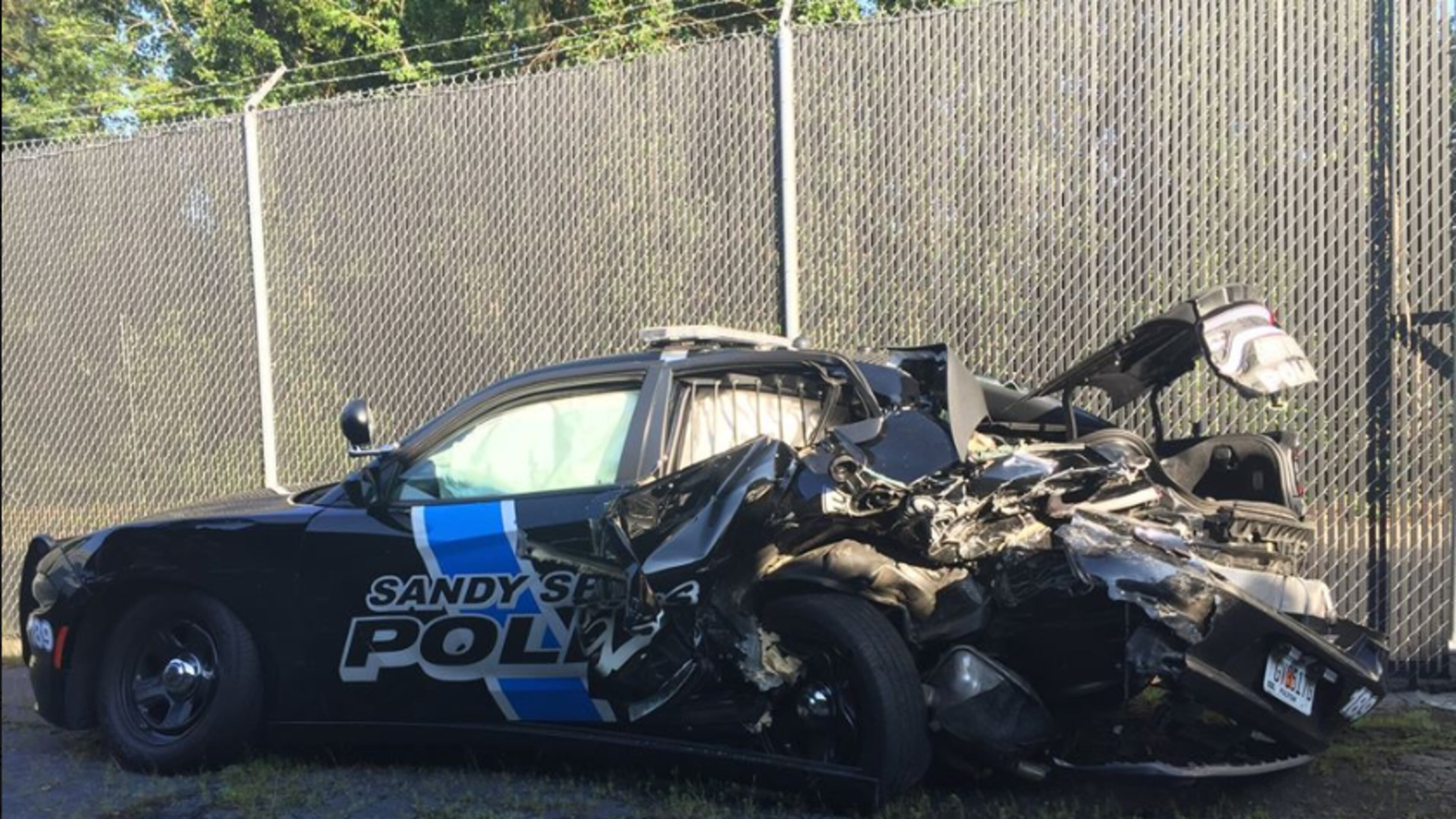 A photo of the Sandy Springs police car after it was stuck.