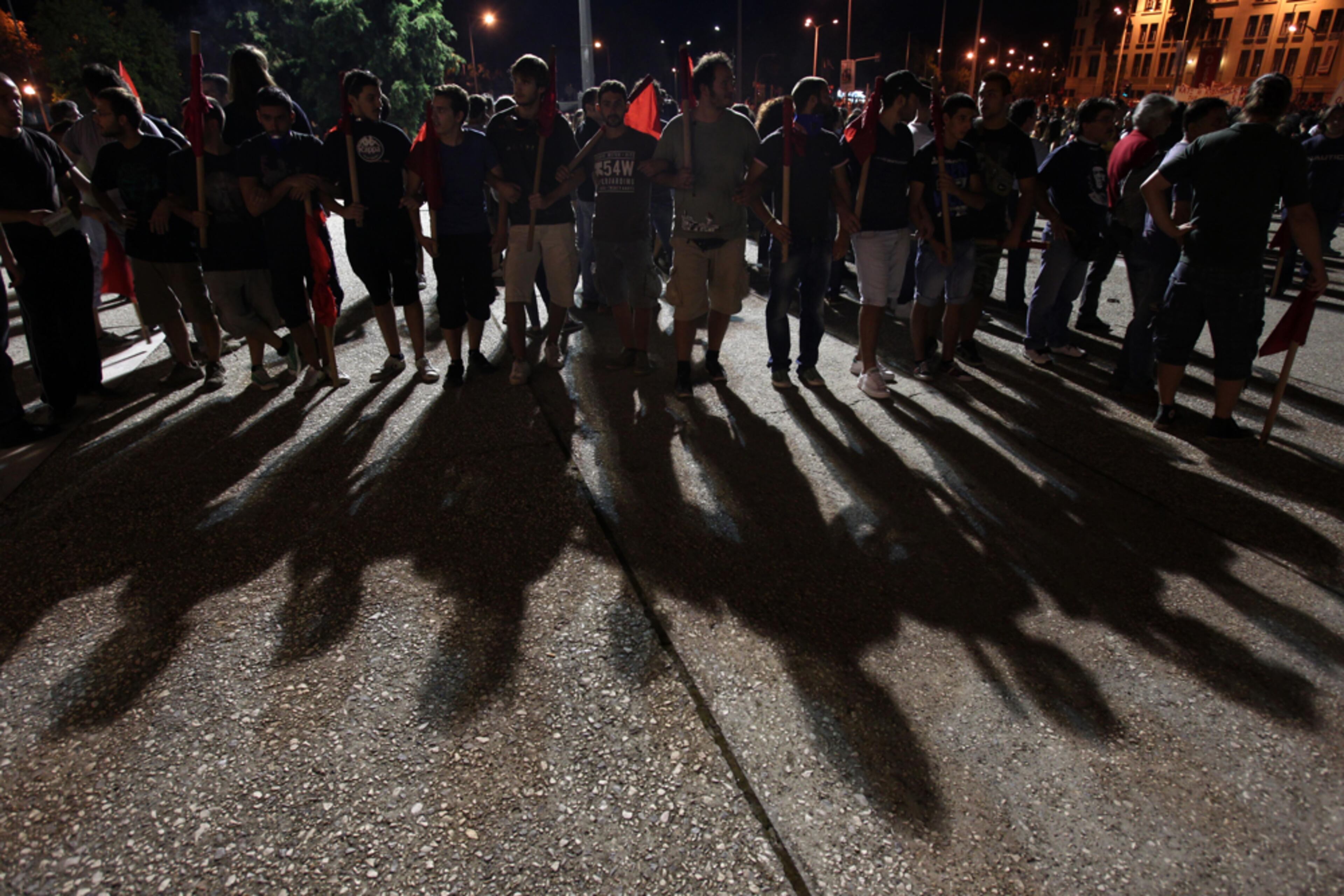 GREEK PROTEST--Protesters gather outside the International Exhibition Center in the northern port city of Thessaloniki, Greece, Saturday, Sept. 8, 2012. Greek Prime Minister Antonis Samaras says the final round of austerity measures contains painful and unjust cuts but is necessary to restore Greece's credibility and continue to receive funding from creditors.