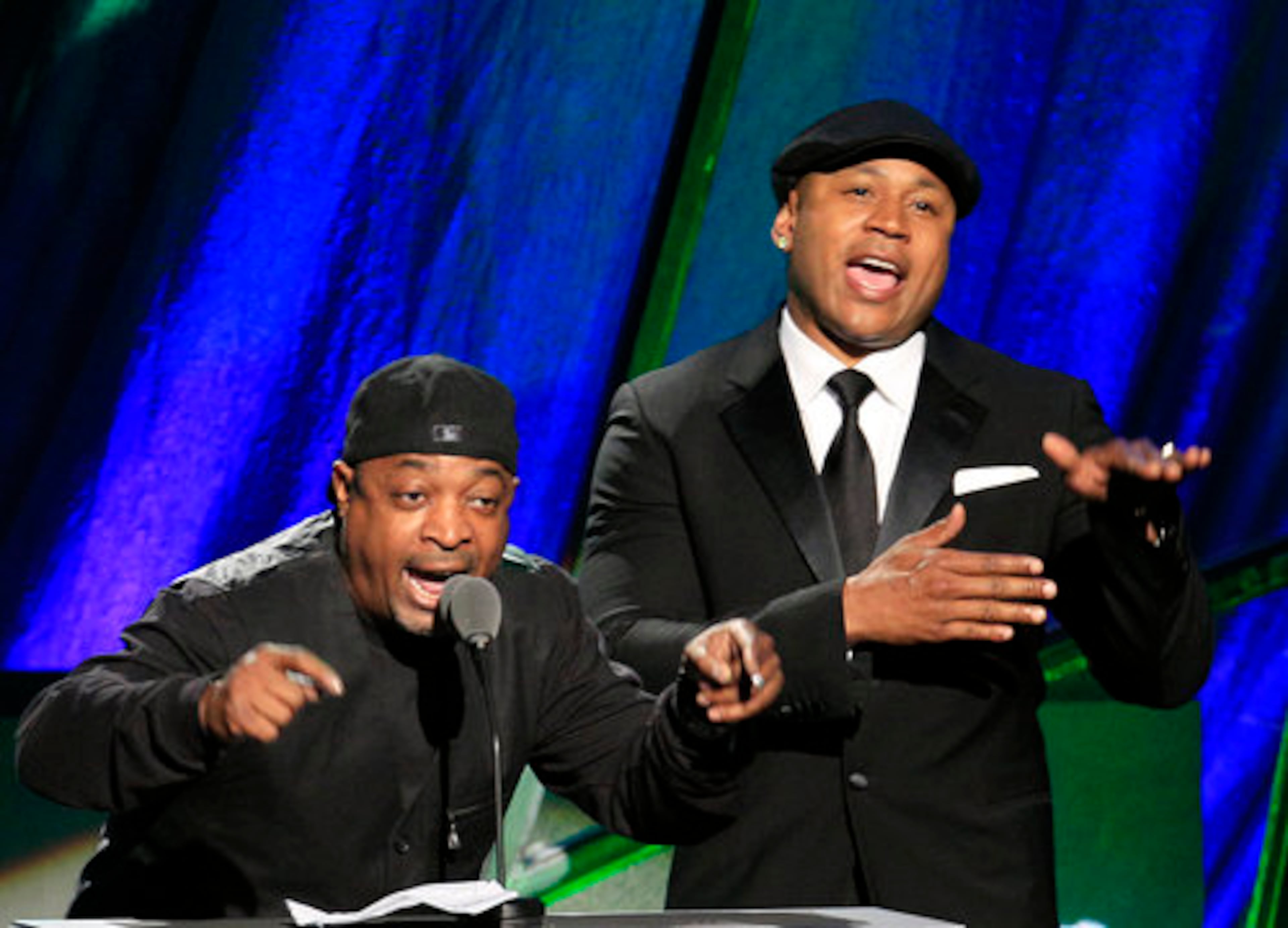 Chuck D, left, and LL Cool J introduce the Beastie Boys for induction into the Rock and Roll Hall of Fame Saturday, April 14, 2012, in Cleveland.