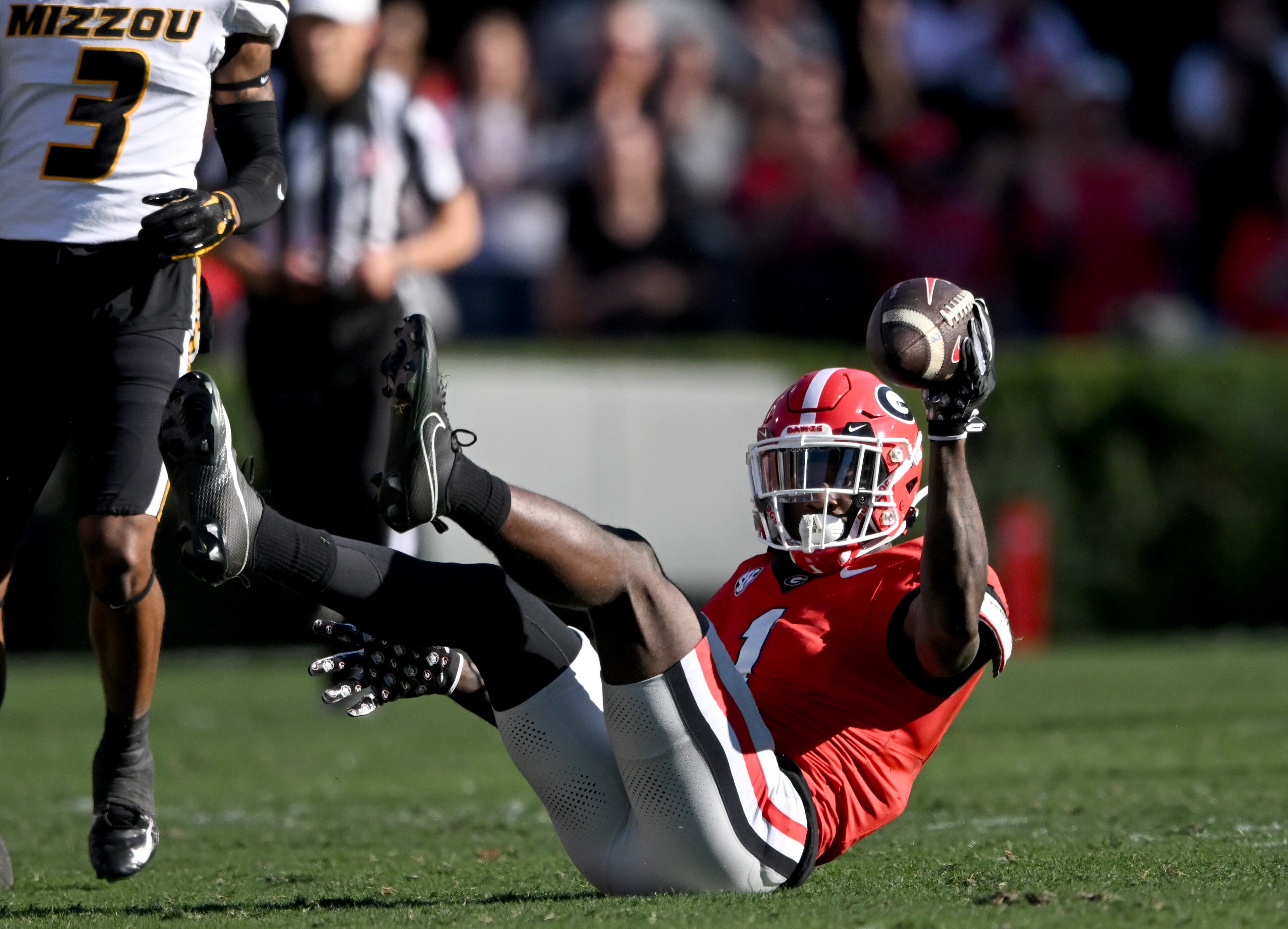 Georgia wide receiver Marcus Rosemy-Jacksaint (1) celebrates after catching a long pass during the first half in an NCAA football game at Sanford Stadium, Saturday, November 4, 2023, in Athens. (Hyosub Shin / Hyosub.Shin@ajc.com)