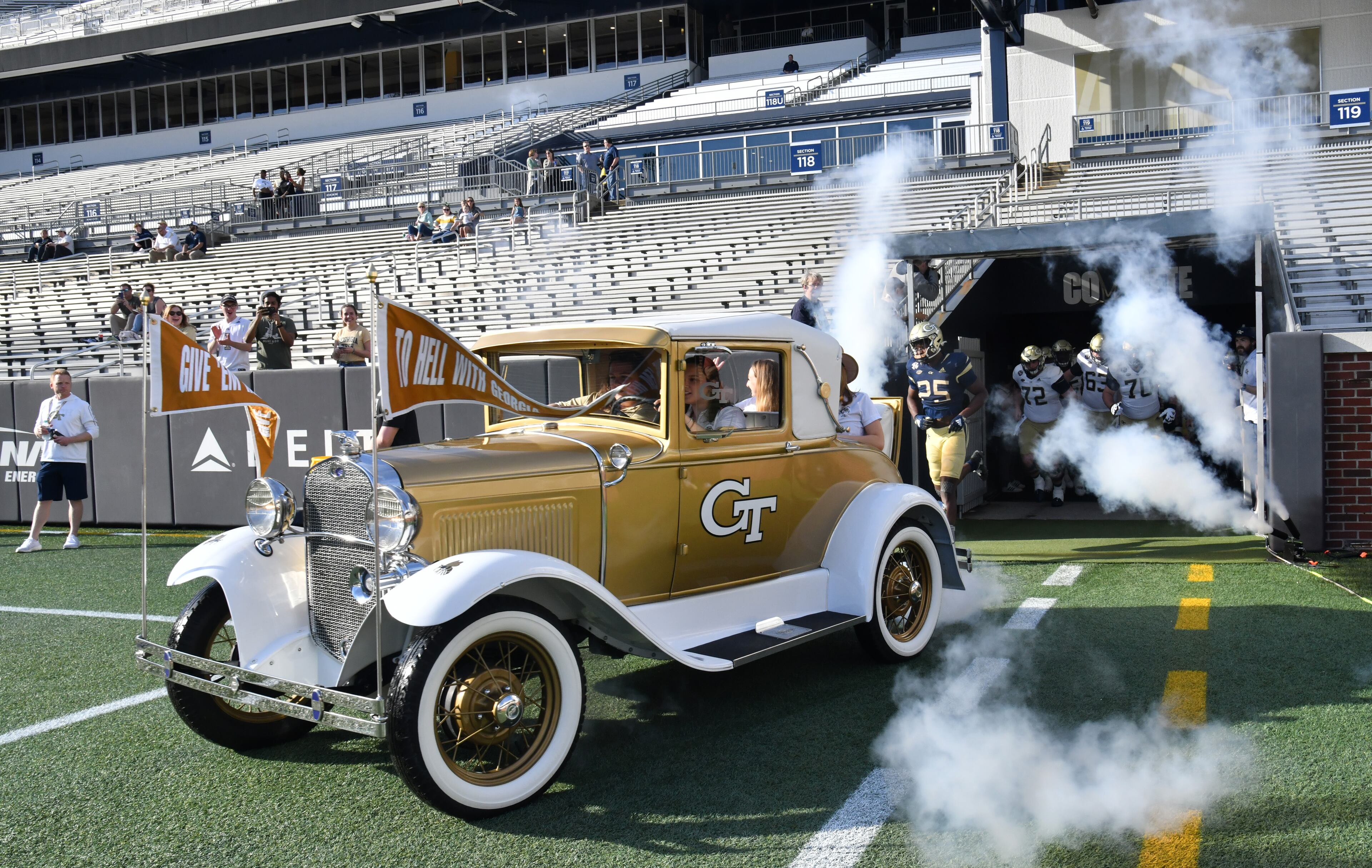 Georgia Tech's Ramblin' Wreck leads players during the 2022 Spring Game at Georgia Tech's Bobby Dodd Stadium in Atlanta on Thursday, March 17, 2022. (Hyosub Shin / Hyosub.Shin@ajc.com)