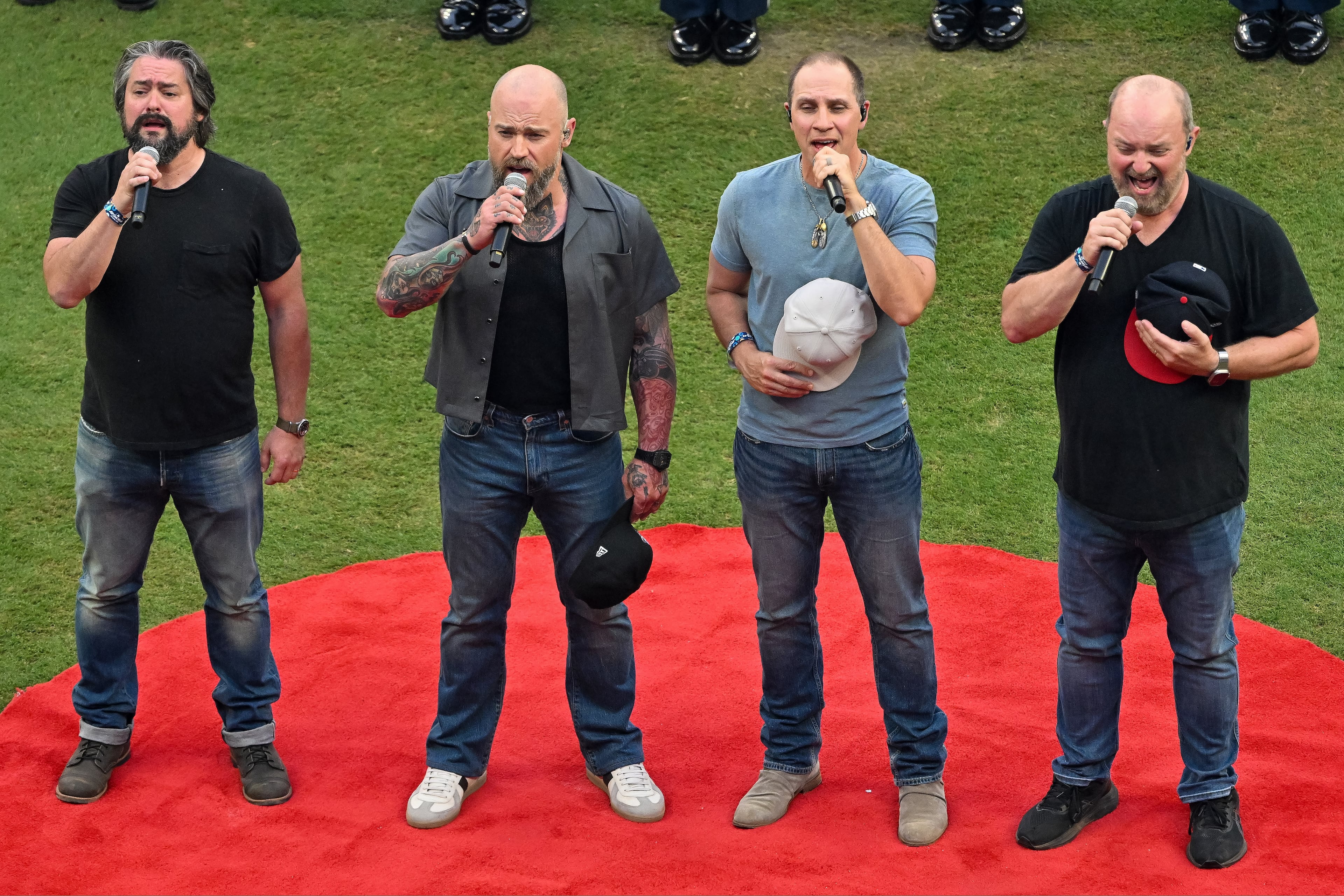 Members of Zac Brown Band sing the U.S. National Anthem to open the MLB All-Star Game at Truist Park in Atlanta on Tuesday, July 15, 2025. (Hyosub Shin/AJC)