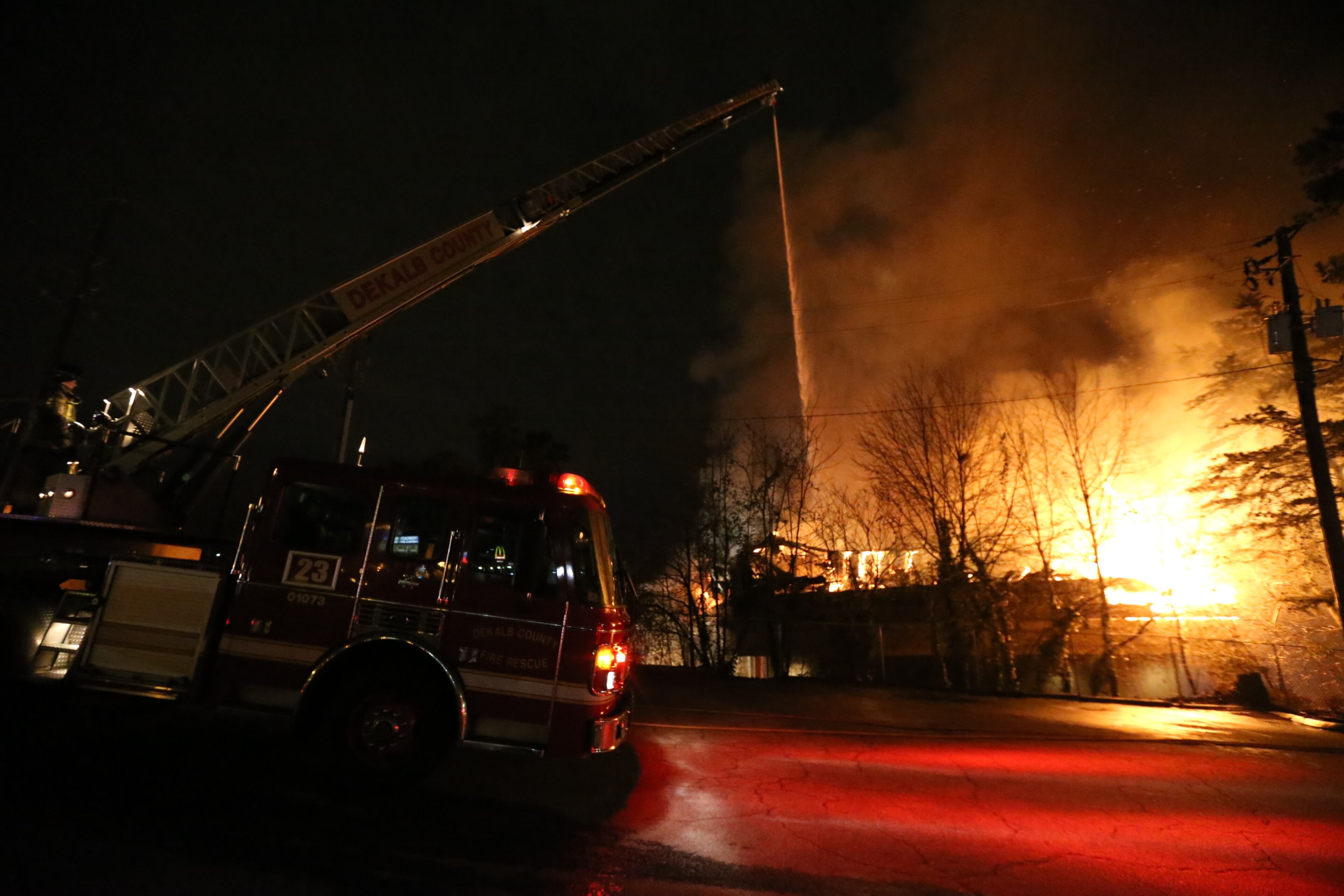 DeKalb County firefighters were battling a huge fire early Tuesday in an office building on Memorial Drive. The blaze broke out before 5 a.m. in a two-story office building in the 4100 block of Memorial Drive, just inside I-285 near Covington Highway. JOHN SPINK/JSPINK@AJC.COM