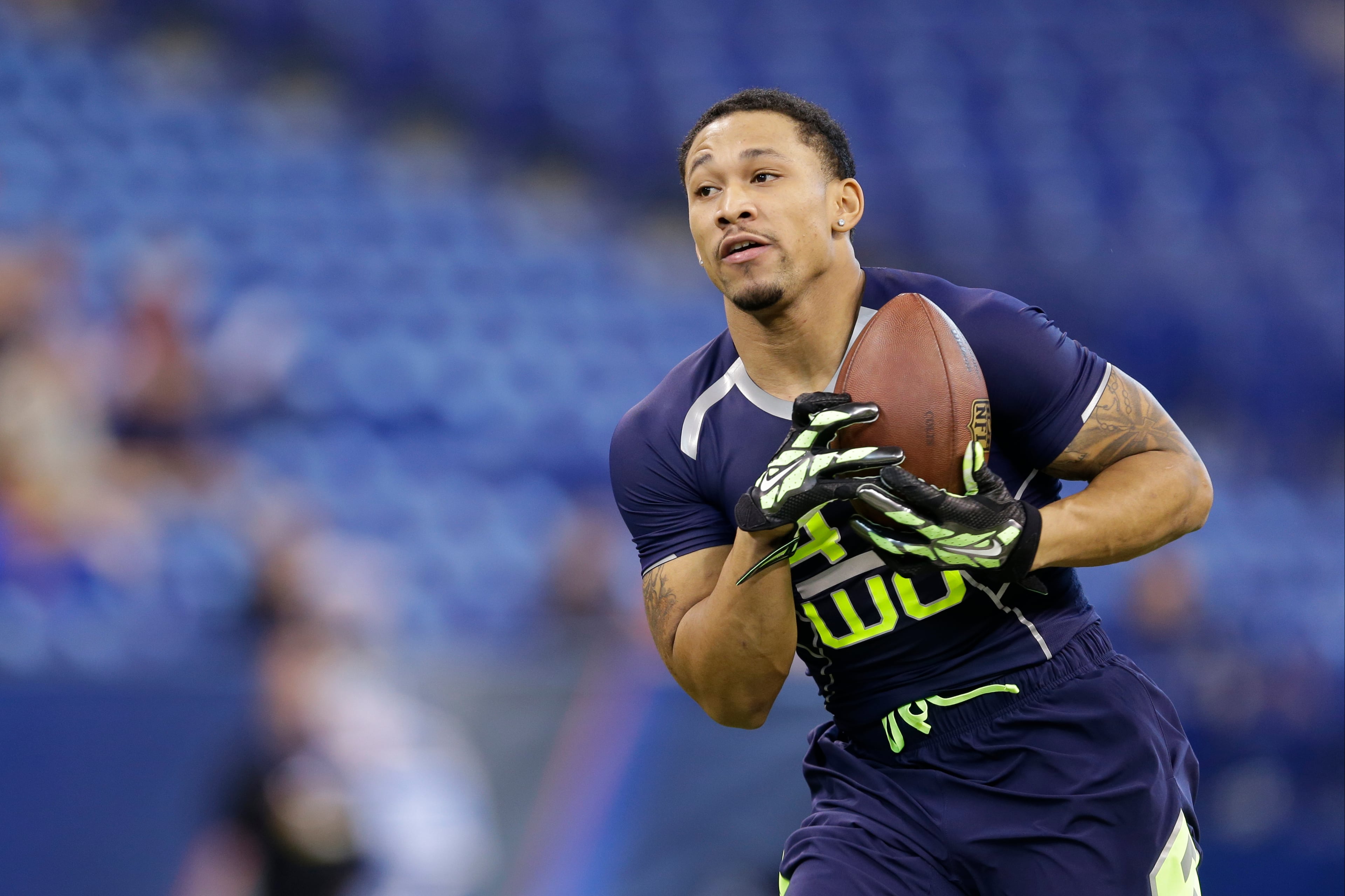Georgia State wide receiver Albert Wilson makes a catch during a drill at the NFL football scouting combine in Indianapolis, Sunday, Feb. 23, 2014. (AP Photo/Michael Conroy)