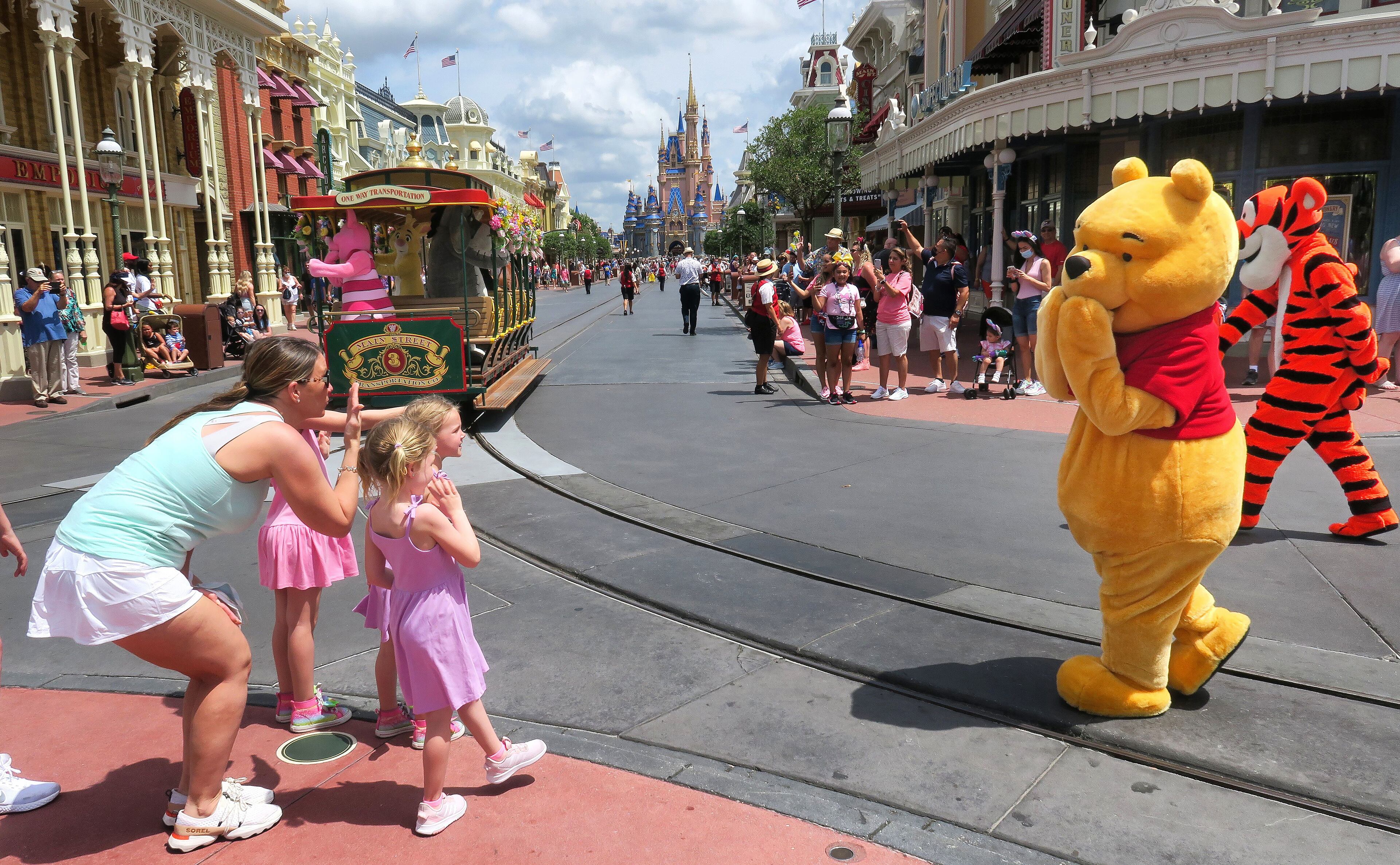 Visitors who aren’t fully vaccinated still will need to wear face masks indoors and on all rides and attractions. All visitors, whether vaccinated or not, will still be required to wear face coverings on buses, monorails and Disney Skyliner, the resort’s aerial gondola, according to the latest guidelines. (Joe Burbank/Orlando Sentinel/TNS)