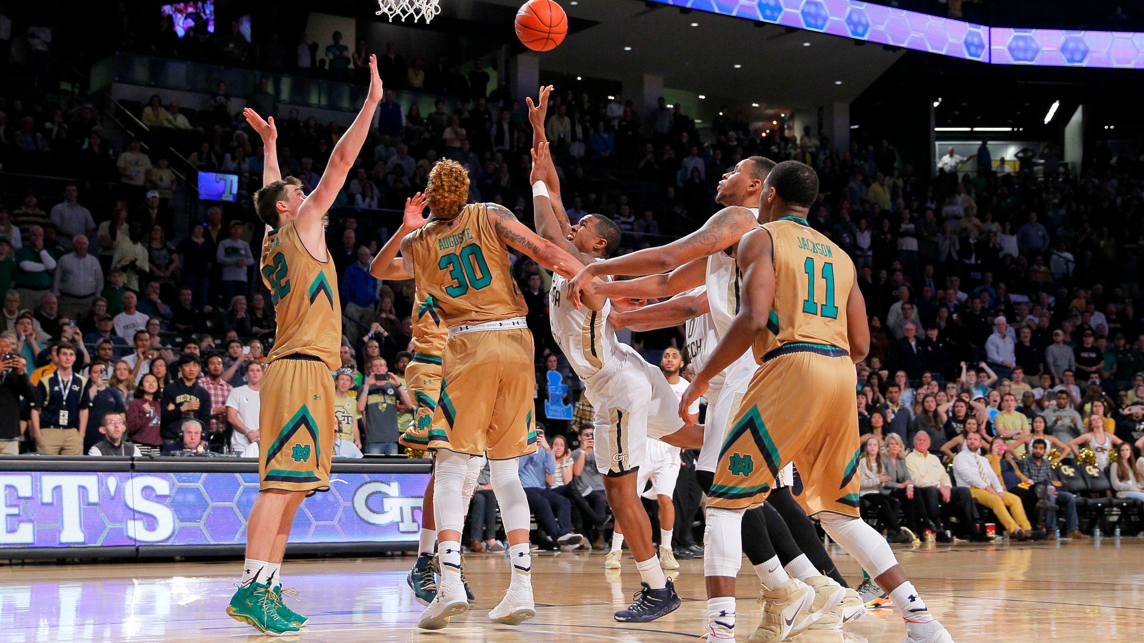 Georgia Tech guard Marcus Georges-Hunt (3) shoots the winning basket in the final seconds of an NCAA college basketball game against Notre Dame in Atlanta, Saturday, Feb. 20, 2016. Georgia Tech won 63-62. (AP Photo/Todd Kirkland)