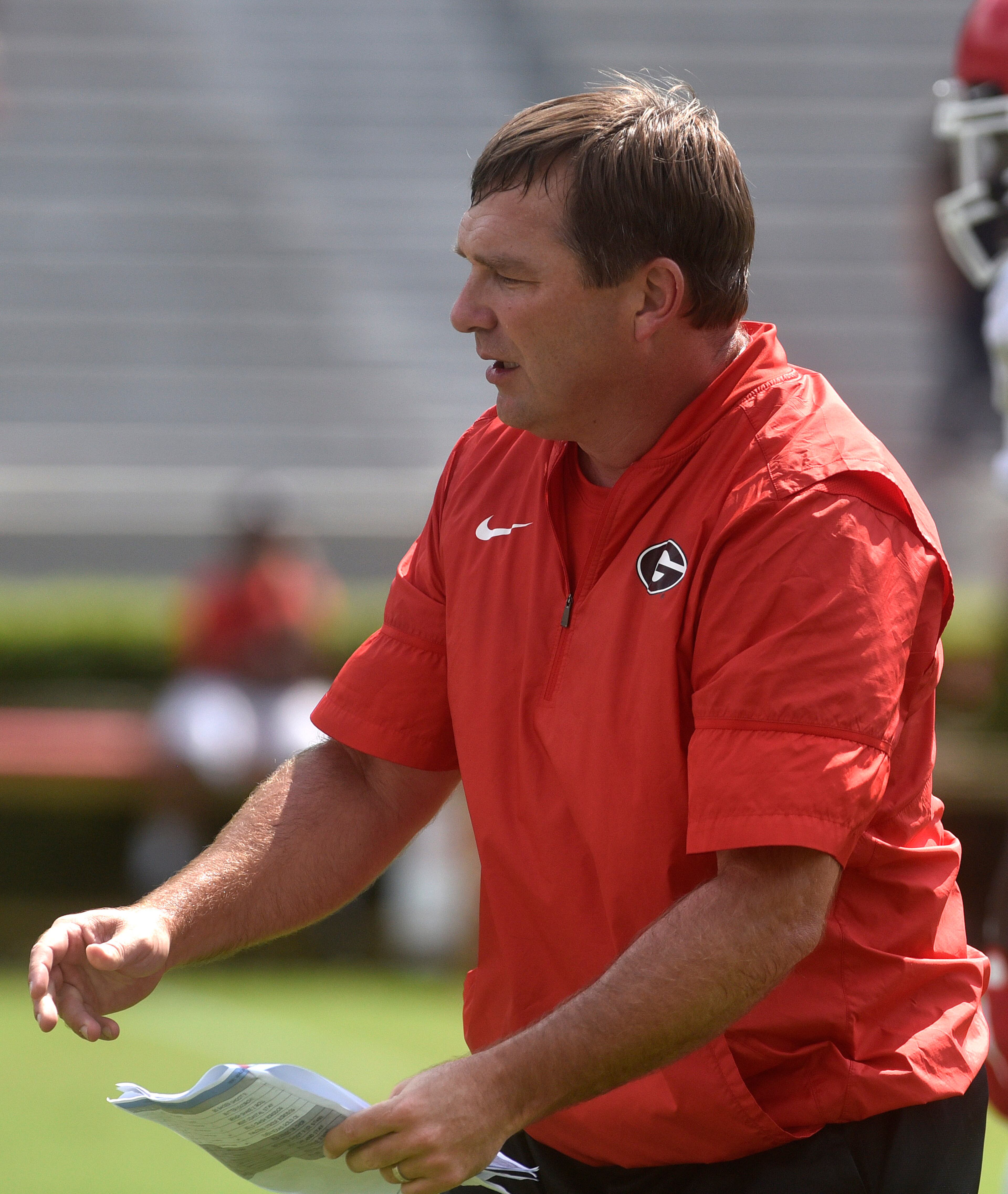 Georgia head coach Kirby Smart calls plays during an open practice during the annual UGA Fan Day at Sanford Stadium on Saturday, Aug 5, 2017 in Athens, Ga.
(RICHARD HAMM)