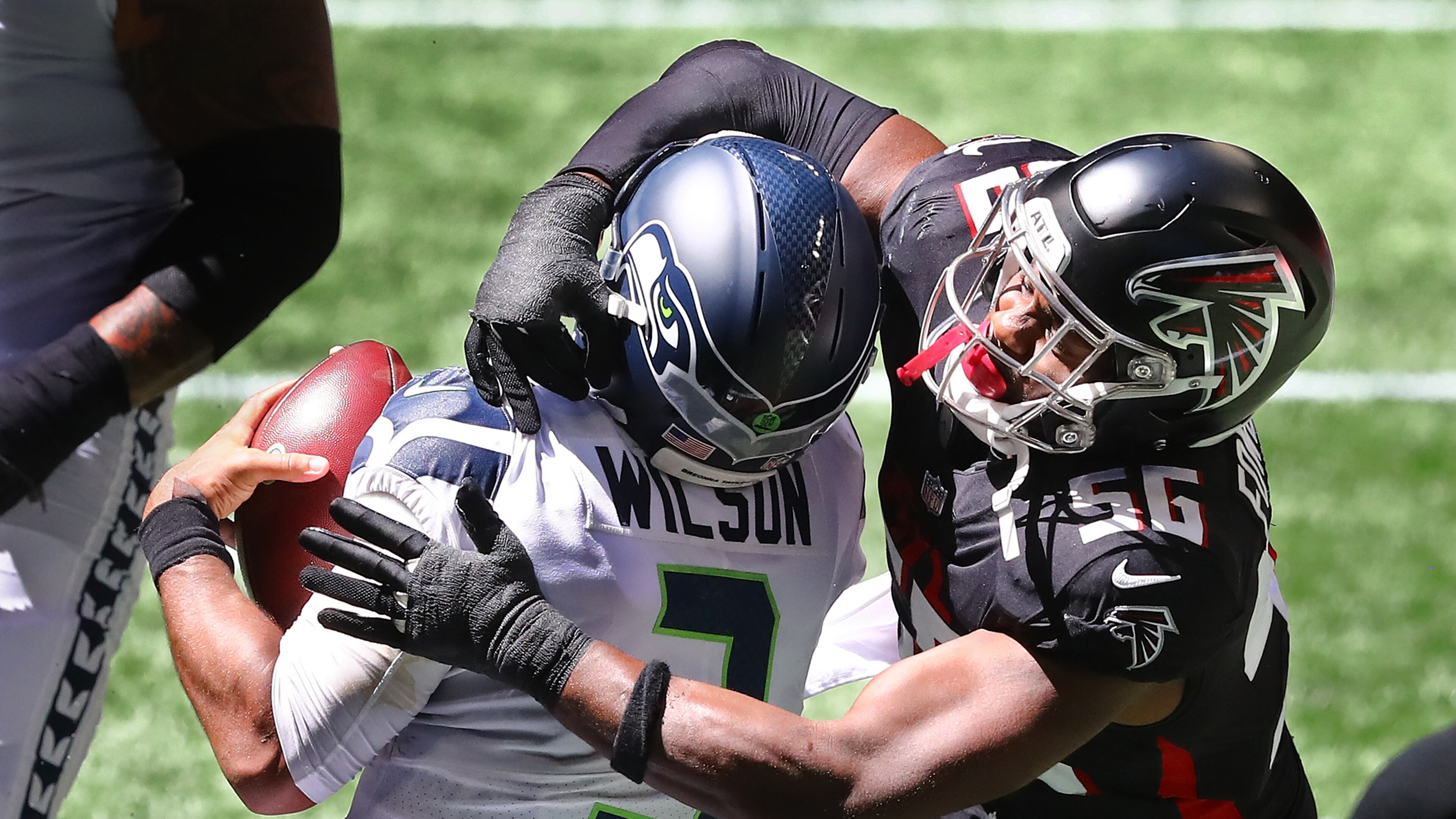 Falcons defensive end Dante Fowler helps sack Seattle Seahawks quarterback Russell Wilson. “Curtis Compton / Curtis.Compton@ajc.com”