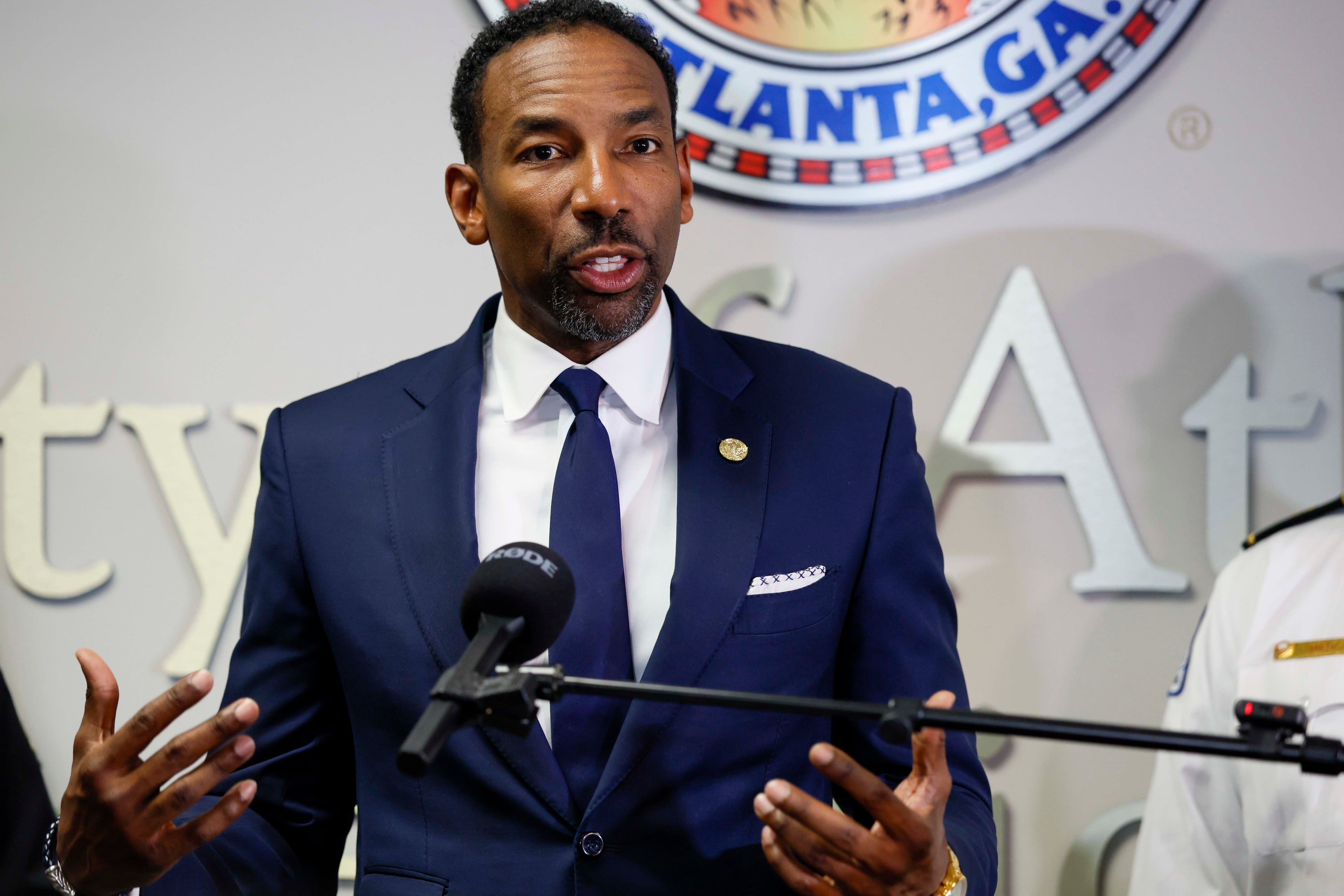 Atlanta Mayor Andre Dickens speaks to reporters alongside city officials during a joint news conference on the city's preparations for the FIFA World Cup. (Miguel Martinez/AJC)