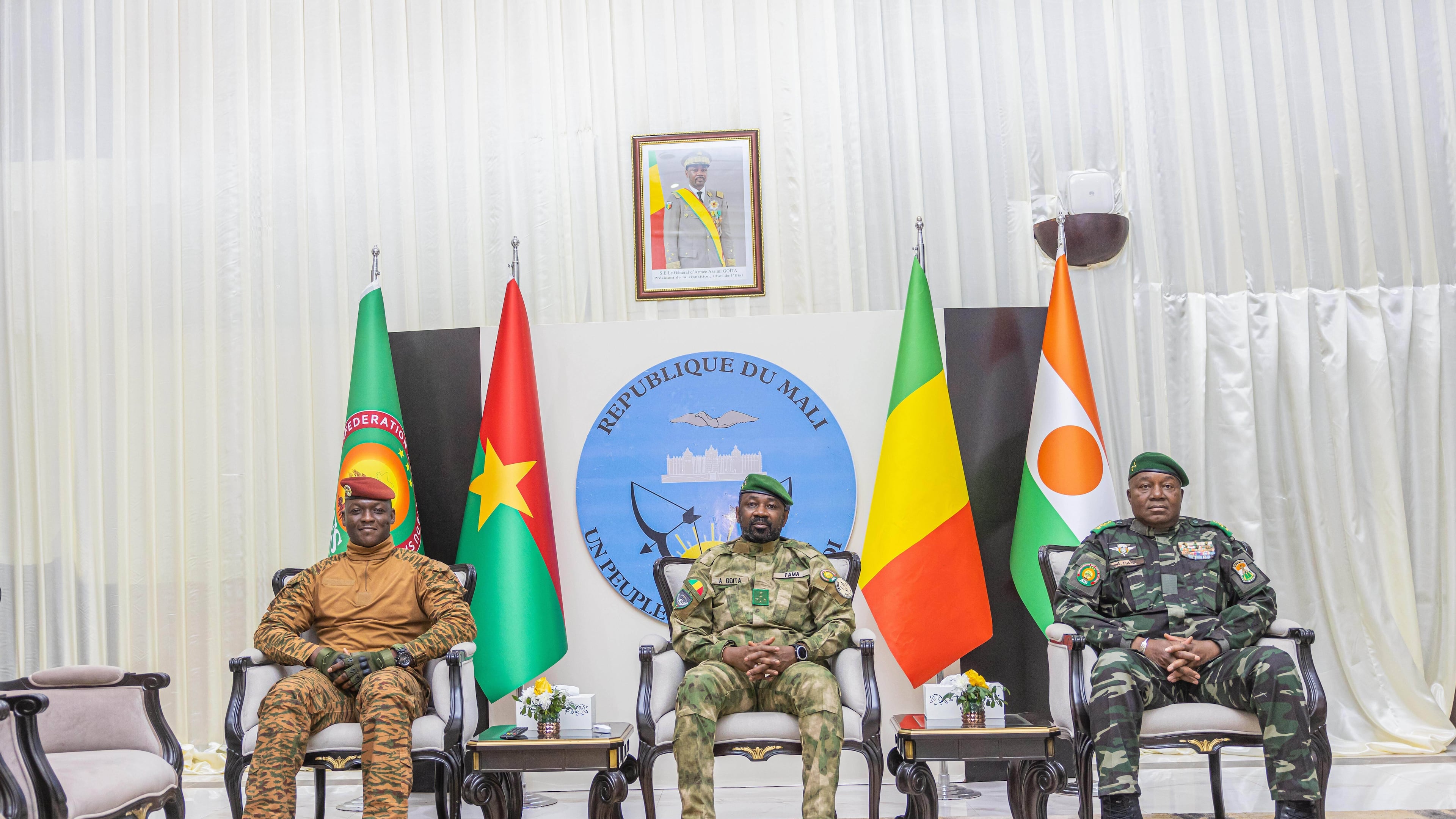 FILE - Captain Ibrahim Traoré of Burkina Faso, left, General Assimi Goïta of Mali, center, and General Abdourahamane Tchiani of Niger attend the second summit on security and development in Bamako, Mali, Tuesday, Dec. 23, 2025. (Mali Government Information Center via AP, File)
