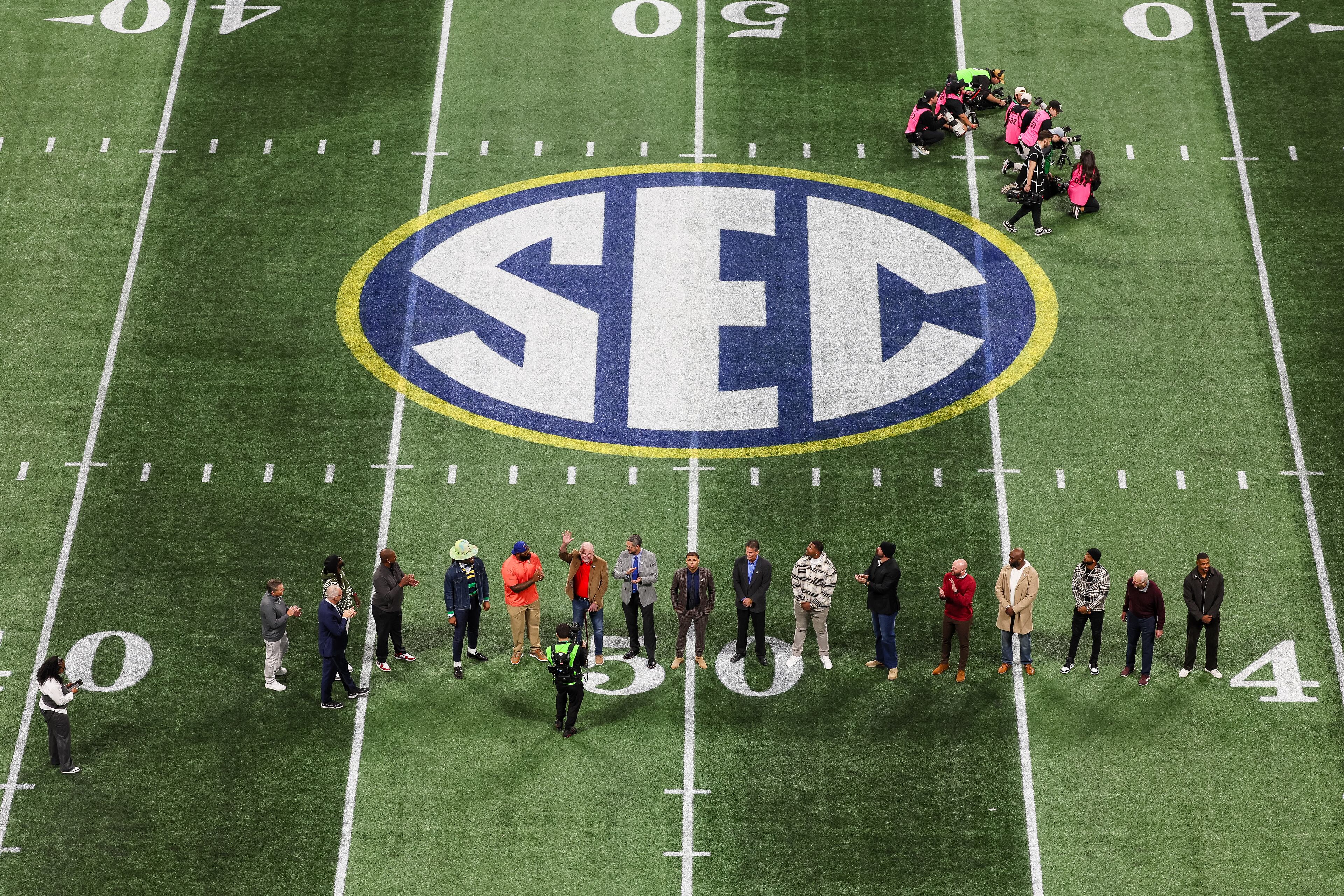 Southeastern Conference legends are recognized before Georgia faces Alabama in the SEC Championship Game at Mercedes-Benz Stadium, Saturday, Dec. 6, 2025, in Atlanta. (Jason Getz / AJC)