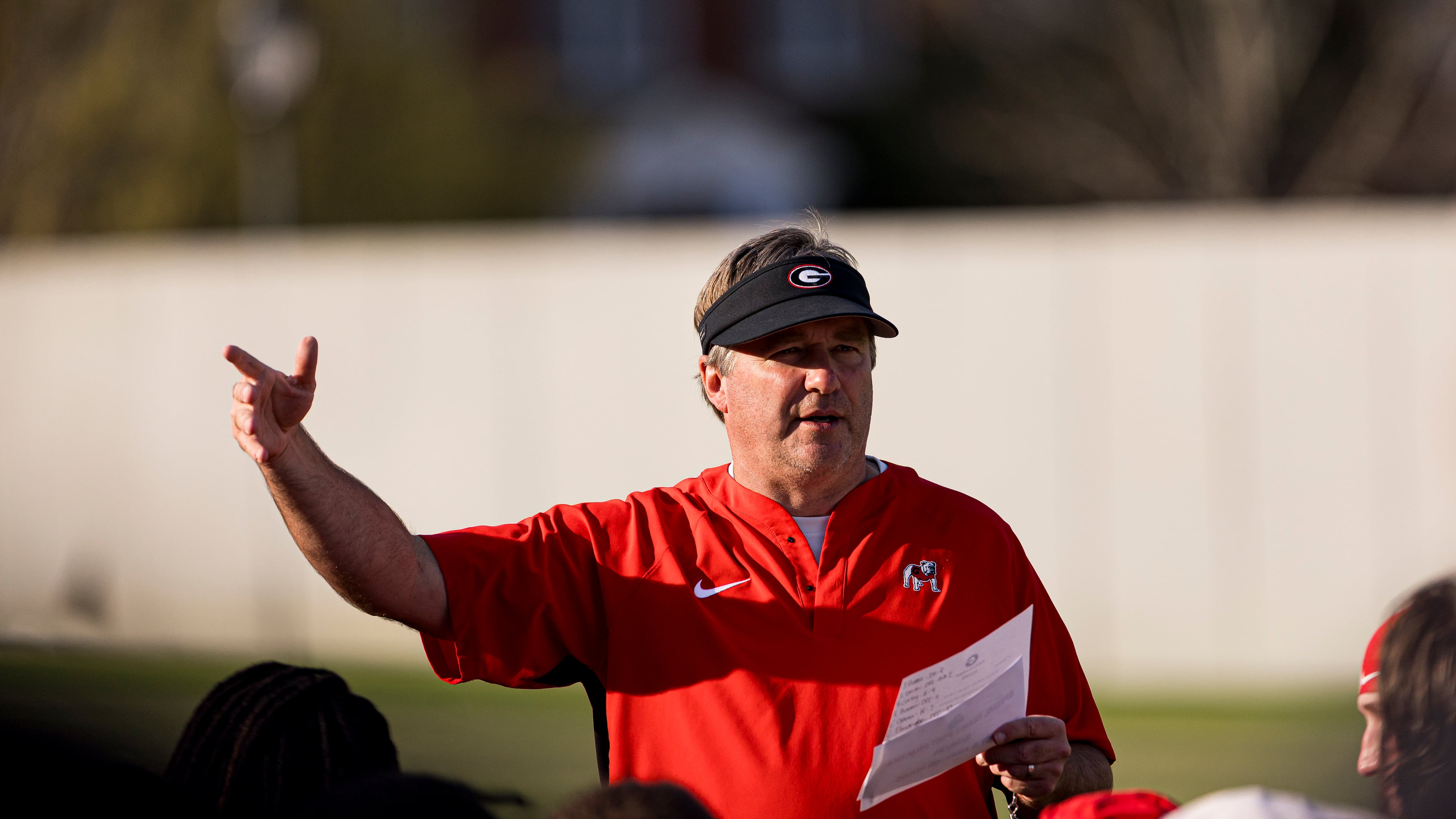 Georgia head coach Kirby Smart talks with his players during practice March 26, 2026. Smart says he's been told other teams don’t practice the same way the Bulldogs do. (Jackson Collier/UGAAA)