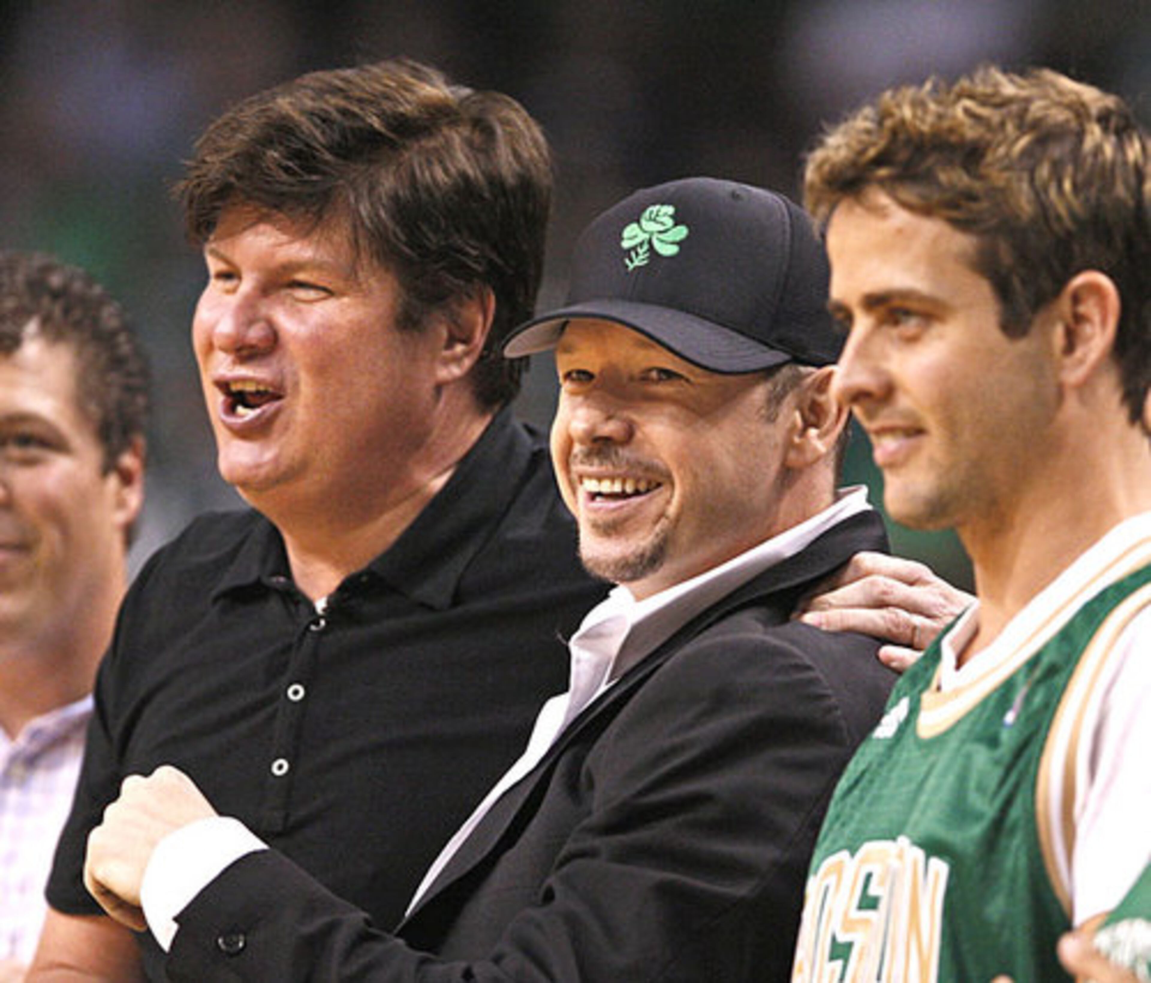 Donnie Wahlberg, center, and Joe McIntyre of New Kids on the Block fame got a kick out of the Celtics' performance.