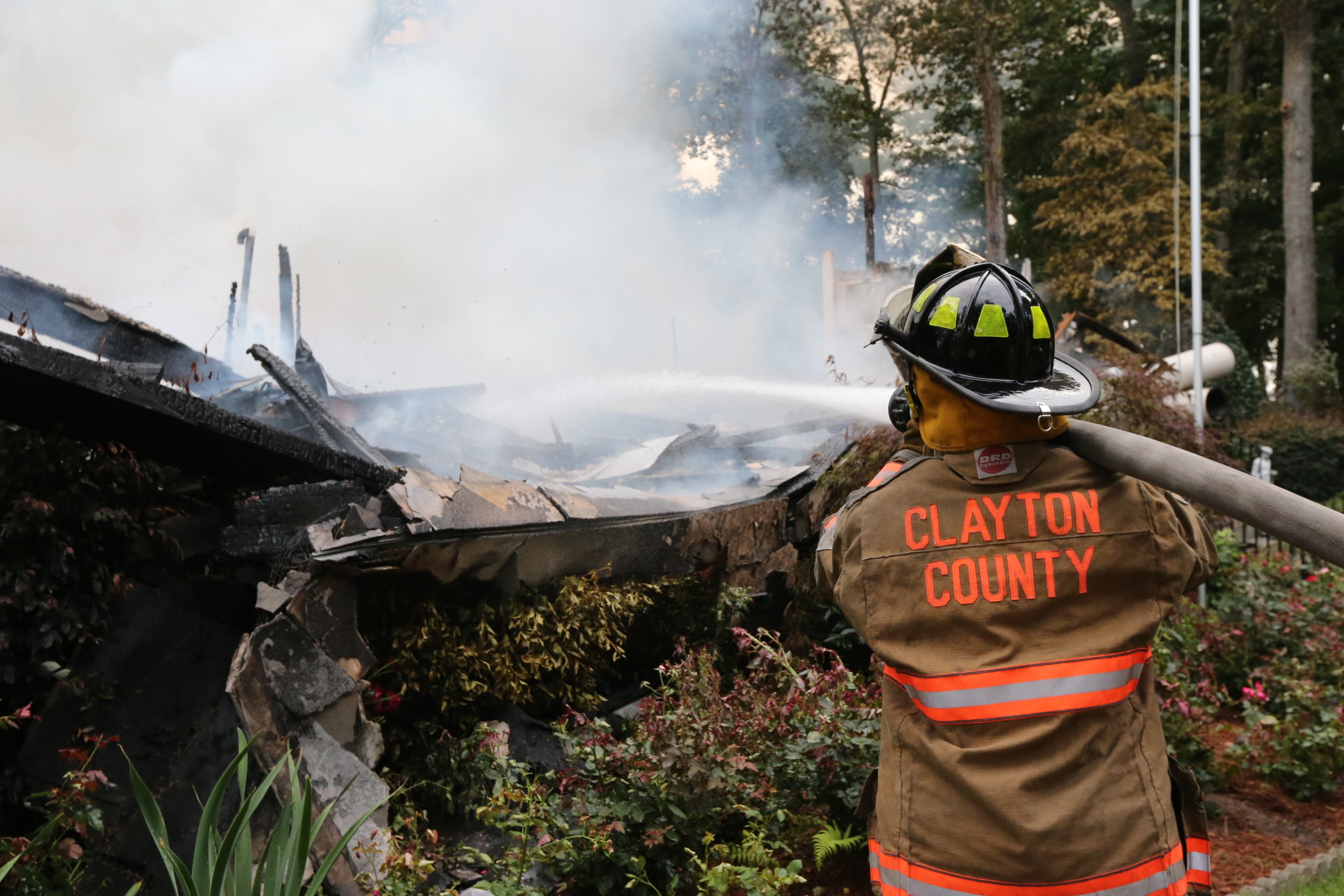Fire crews received a report of a fire at the home in the 2500 block of Emerald Drive about 6:10 a.m., said Capt. Walter L. Barber with Clayton County Fire & Emergency Services. JOHN SPINK/JSPINK@AJC.COM