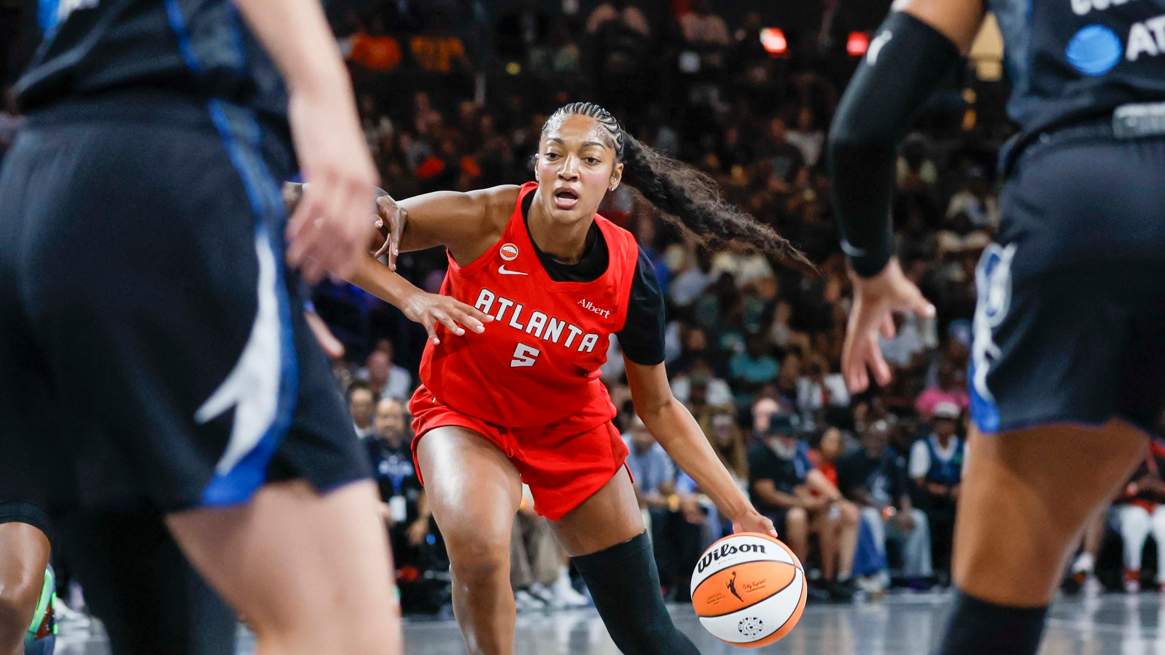 Atlanta Dream forward Angel Reese (5) dribbles during the first half of a WNBA game against the Minnesota Lynx at Gateway Center Arena on Sunday, August 30, 2026, in Atlanta. (Miguel Martinez/ AJC)
