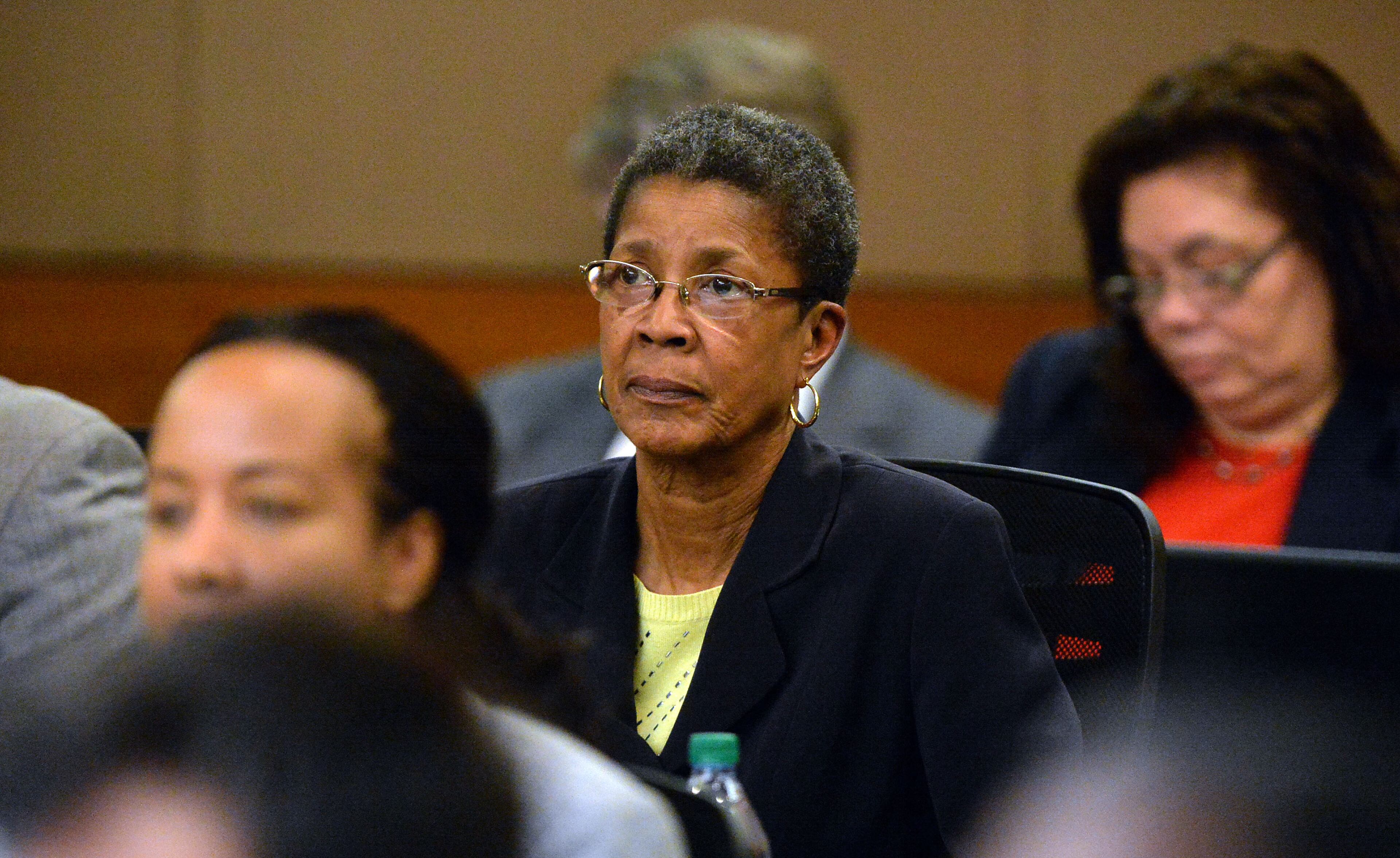 Former Dobbs Elementary teacher Dessa Curb, one of a dozen defendants in the APS test-cheating trial, listens as her lawyer, Sanford Wallack, presents a closing argument on her behalf Tuesday. (Atlanta Journal-Constitution, Kent D. Johnson, Pool)