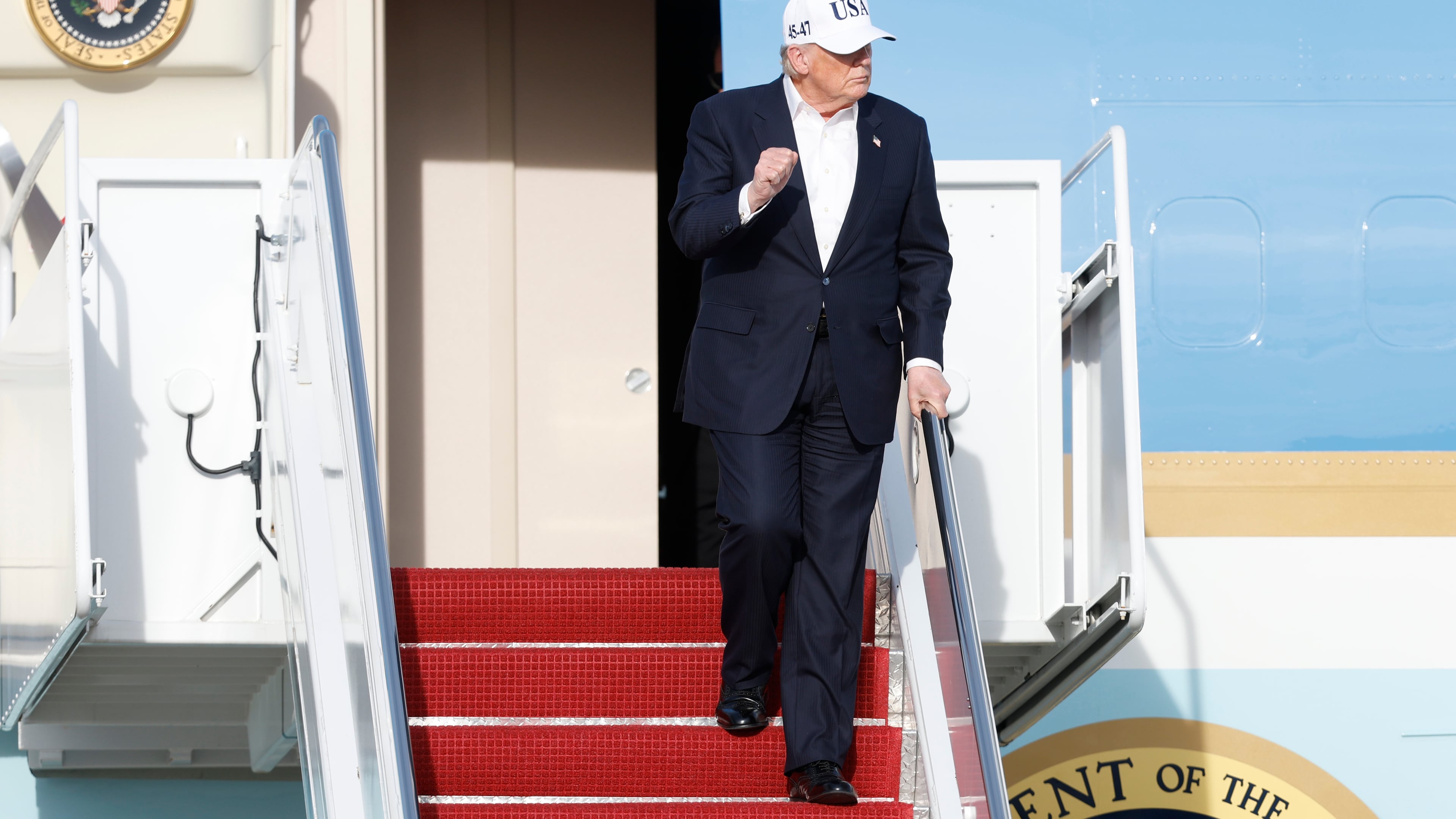 President Donald Trump walks down the stairs of Air Force One upon his arrival at Joint Base Andrews, Md., Friday, Nov. 15, 2026. (AP Photo/Luis M. Alvarez)