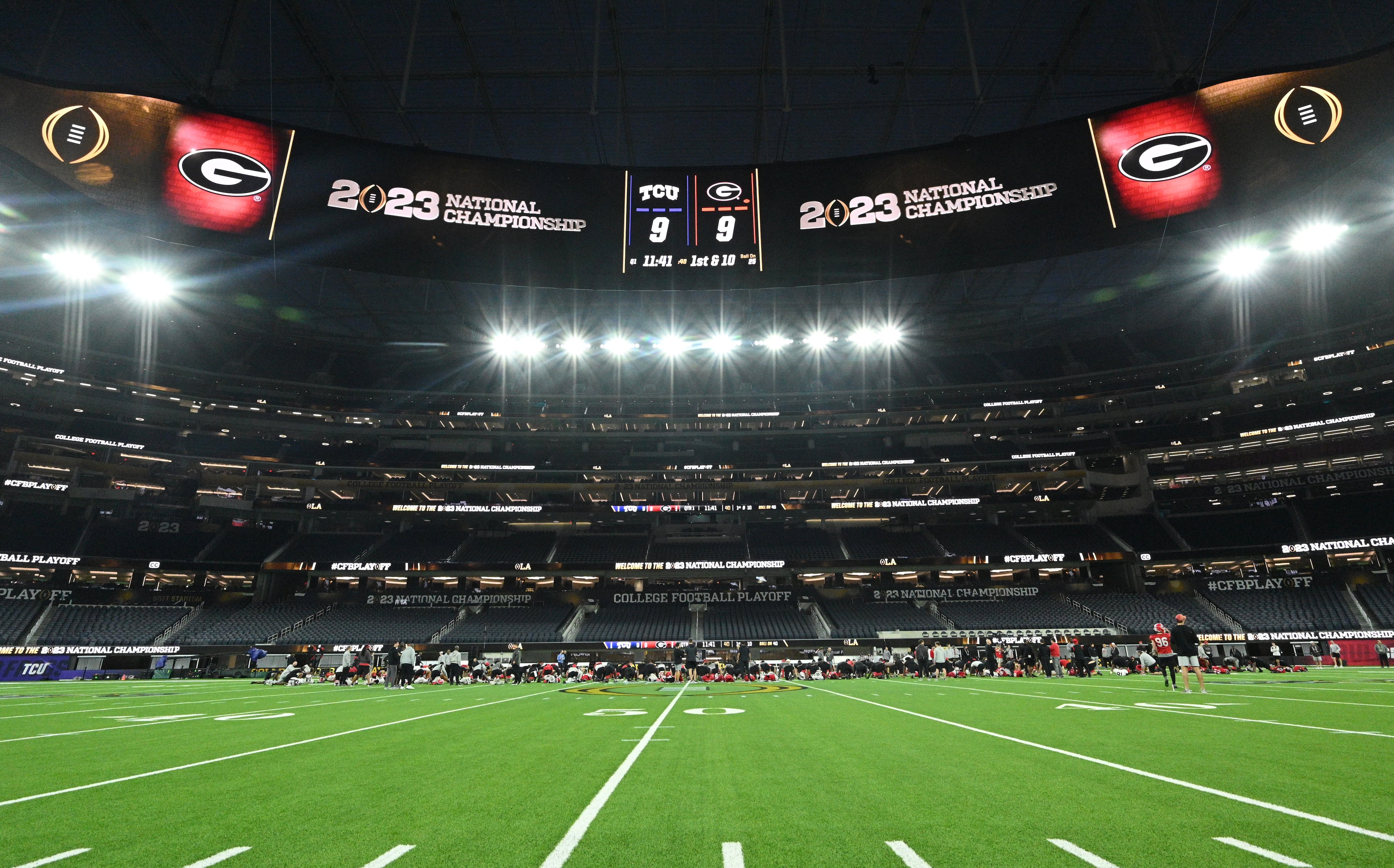 Georgia players participate in a yoga session during the media viewing portion of practice at SoFi Stadium ahead of the national championship NCAA College Football Playoff game between Georgia and TCU, Saturday, Jan. 7, 2023, in Los Angeles. (Hyosub Shin / Hyosub.Shin@ajc.com)