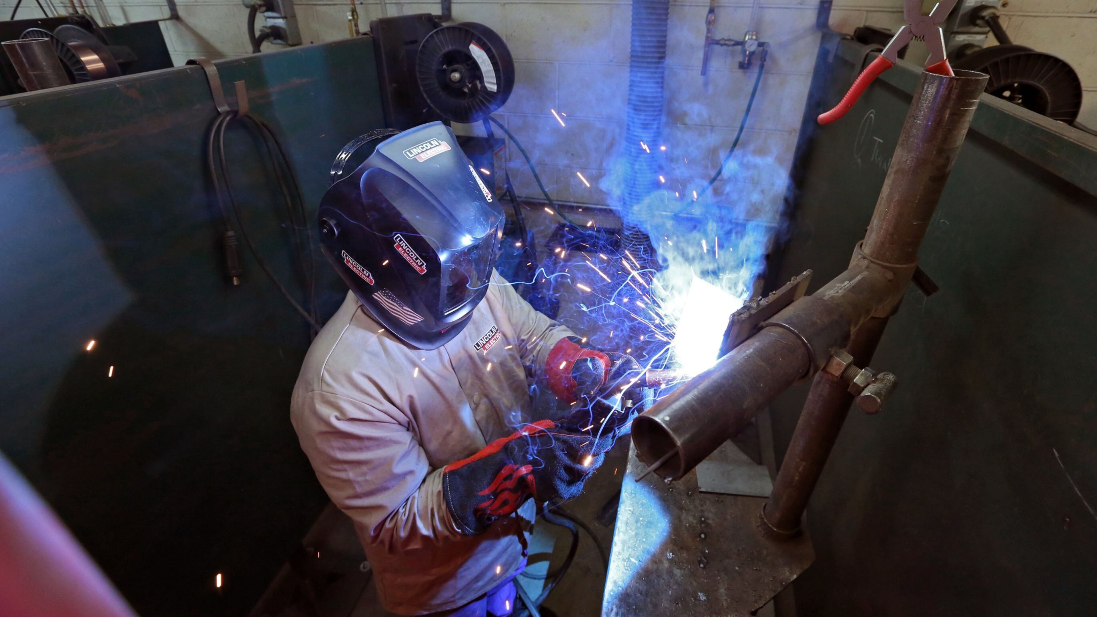 Nov. 13, 2015 - A Lanier Charter Career Academy student works on a MIG welding assignment in a class at nearby Lanier Technical College. BOB ANDRES / BANDRES@AJC.COM