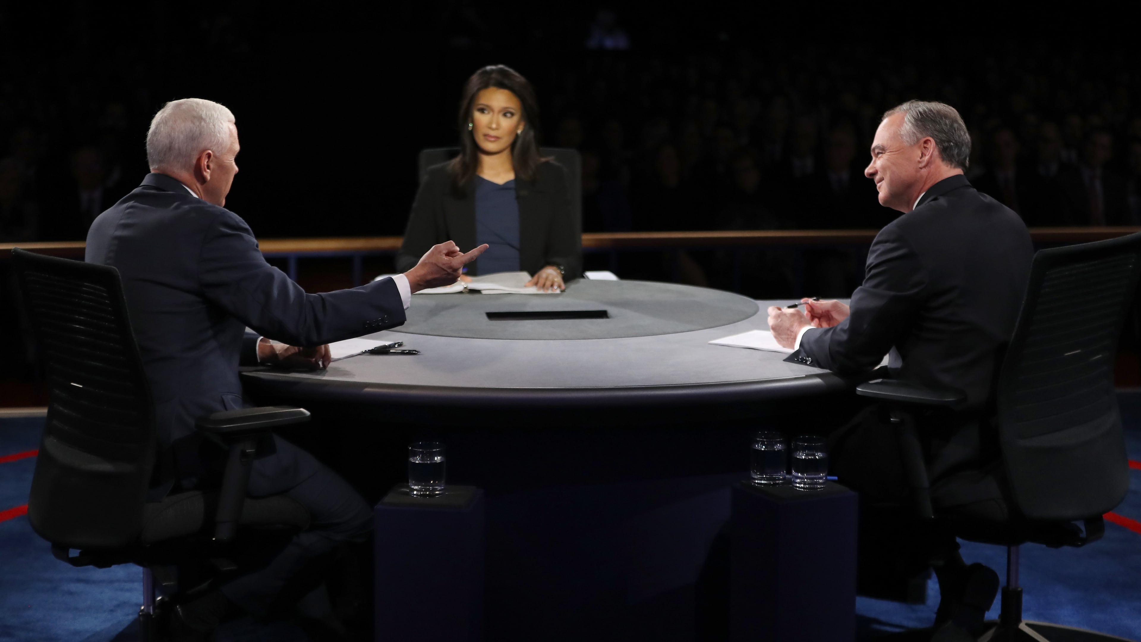 FARMVILLE, VA - OCTOBER 04: Republican vice presidential nominee Mike Pence (L) speaks as Democratic vice presidential nominee Tim Kaine (R) and debate moderator Elaine Quijano (C) listen during the Vice Presidential Debate at Longwood University on October 4, 2016 in Farmville, Virginia. This is the second of four debates during the presidential election season and the only debate between the vice presidential candidates. (Photo by Joe Raedle/Getty Images)