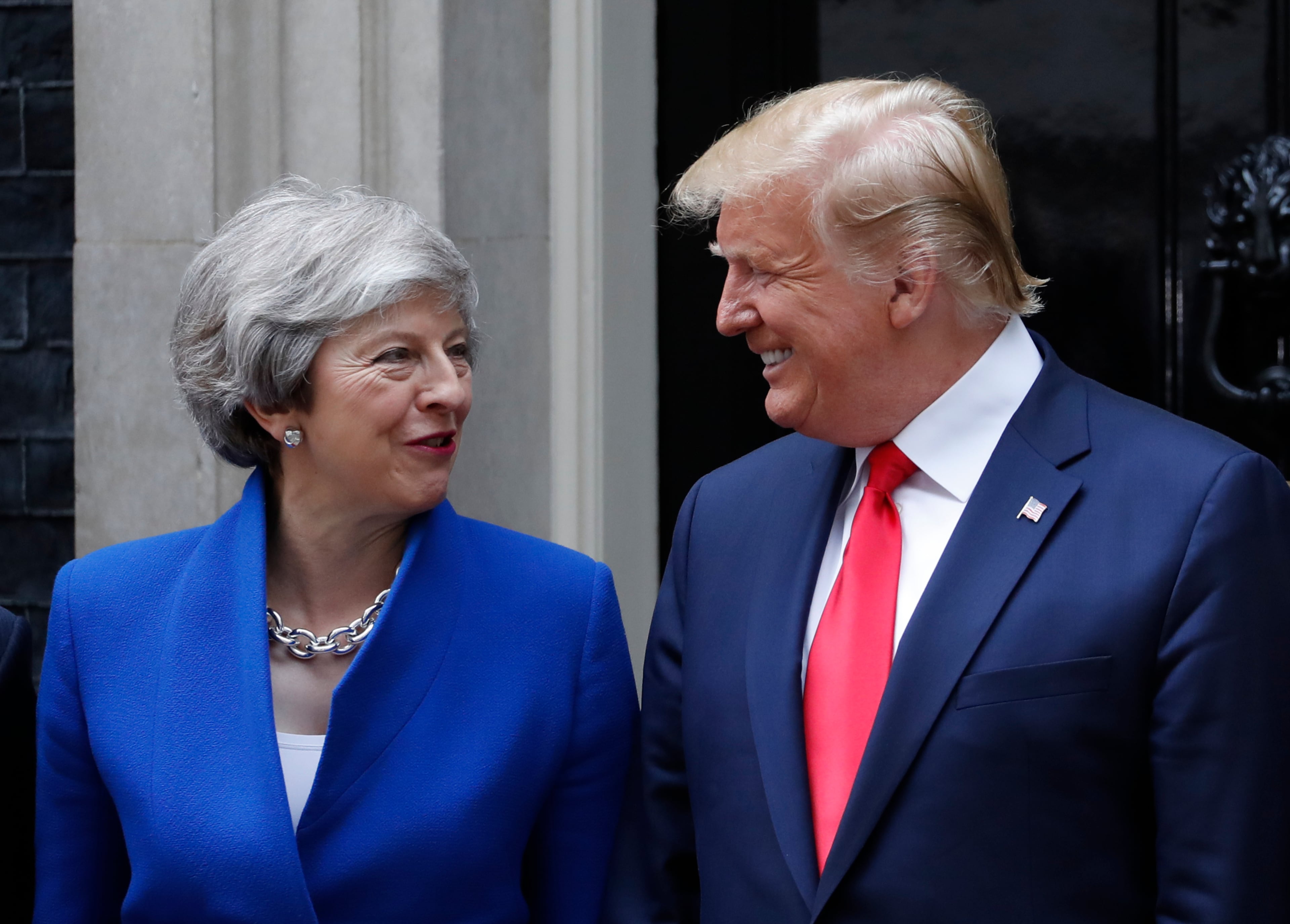 Britain's Prime Minister Theresa May welcomes President Donald Trump outside 10 Downing Street in central London, Tuesday, June 4, 2019. President Donald Trump will turn from pageantry to policy Tuesday as he joins British Prime Minister Theresa May for a day of talks likely to highlight fresh uncertainty in the allies' storied relationship. (AP Photo/Alastair Grant)