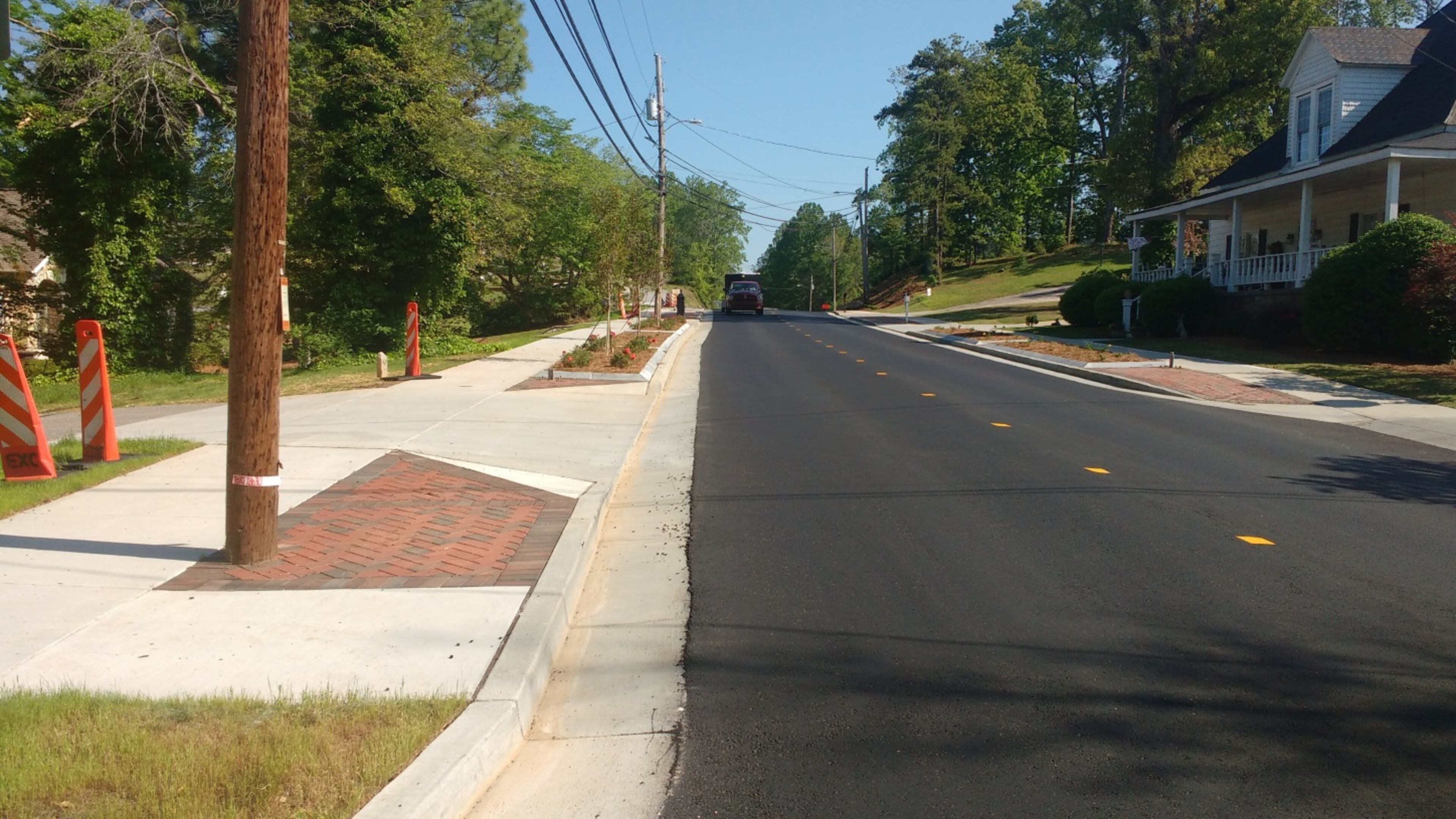 Excellere Construction will be repairing sidewalks and adding or replacing wheelchair accessible ramps in Alpharetta's downtown overlay district like these the company poured in Milton. (Courtesy Excellere Construction)