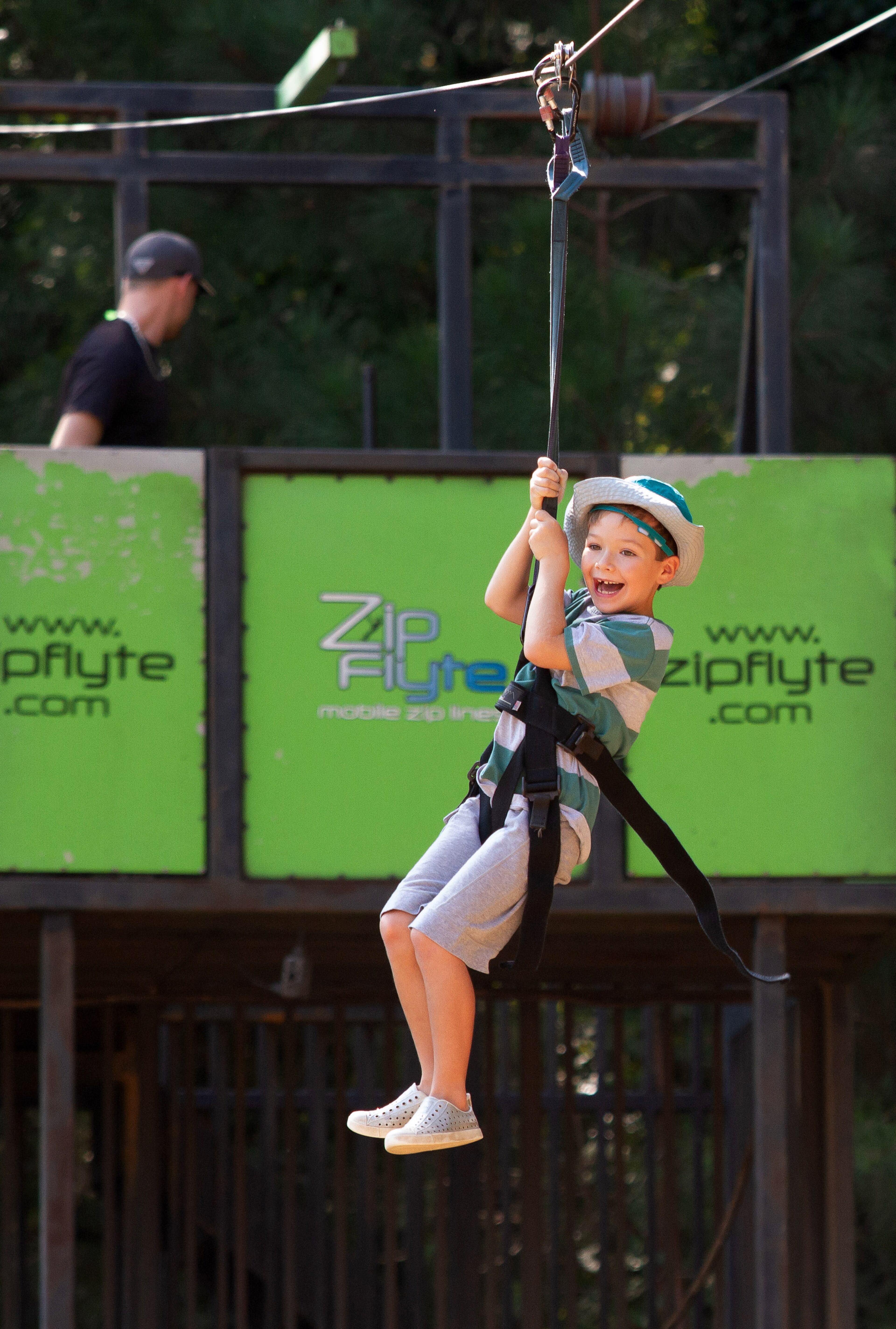 Conway Kirbo, 6, takes a spin on the Zipfly ride in the kid zone during the Atlanta Greek Festival on Sunday, September 29, 2019. STEVE SCHAEFER / SPECIAL TO THE AJC