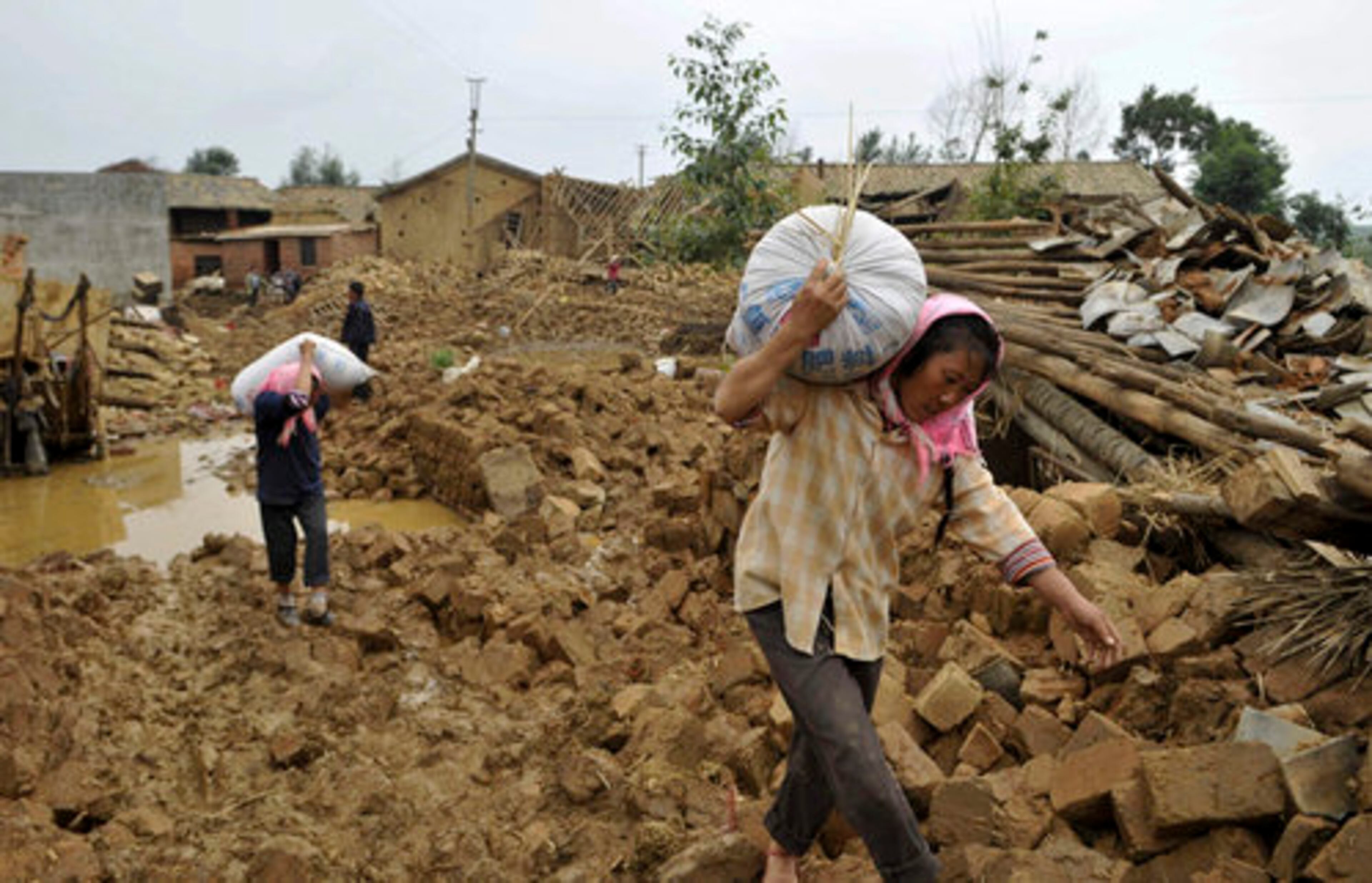 June 29, southwestern China - More than 3 million people have fled their homes after weeks of massive rains struck China's Yunnan province. More than 370 have been killed and 140 more feared missing following weeks of flooding. A landslide in Dazhai Village, Guanling County, trapped more than 100 people.