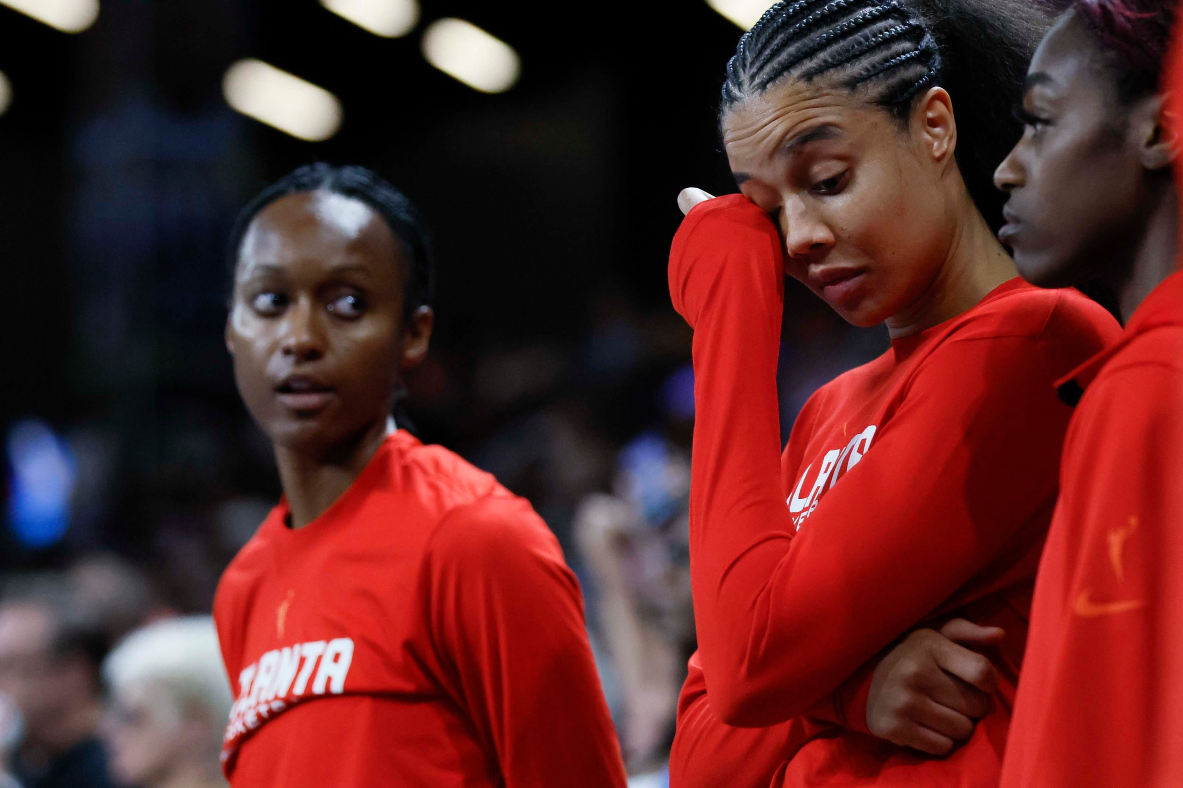 Atlanta Dream players react after losing 87-85 in the first-round playoff game against the Indiana Fever at Gateway Center Arena on Thursday, Sept. 18, 2024, in Atlanta. (Miguel Martinez/ AJC)