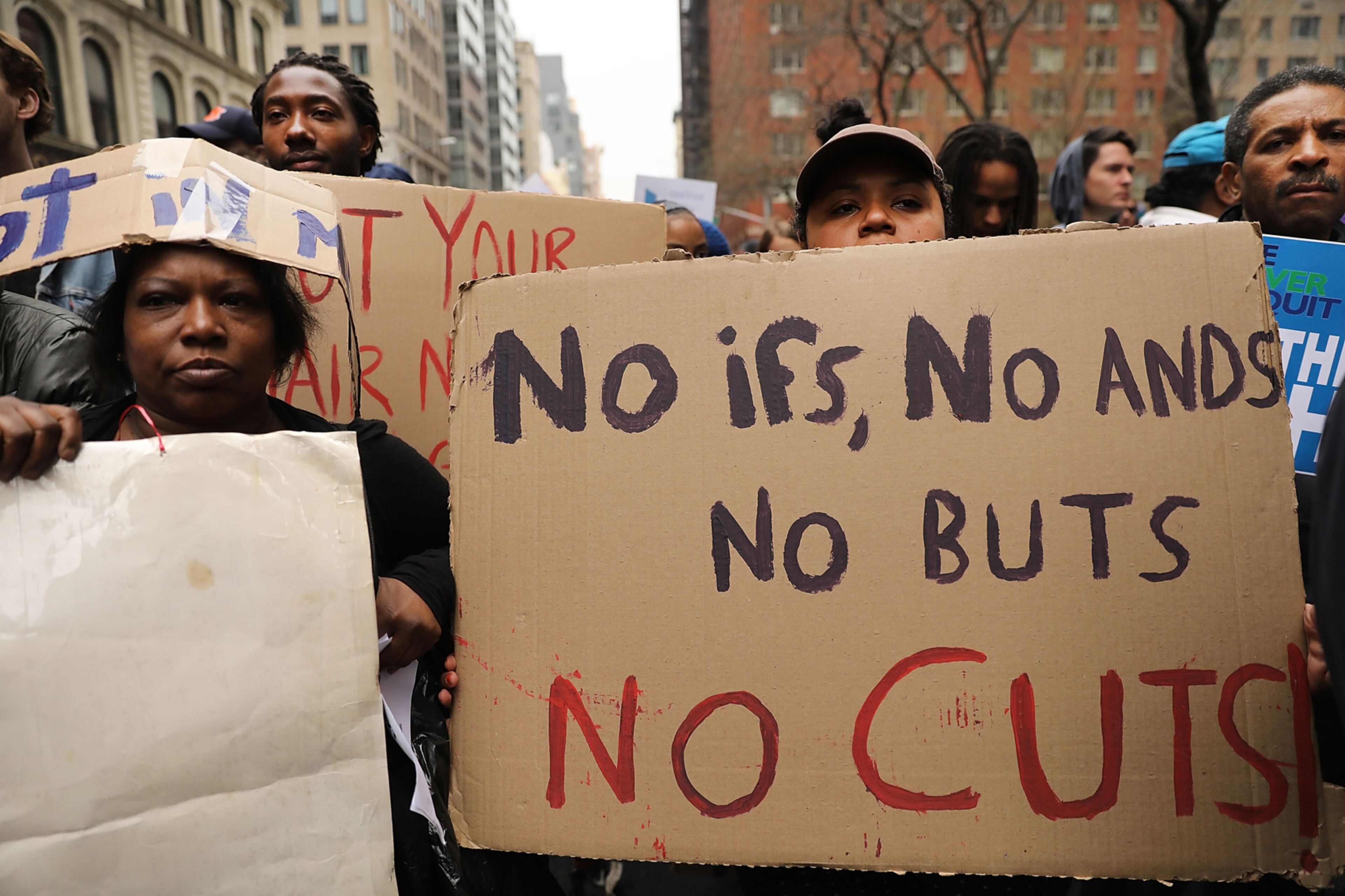 NEW YORK, NY - APRIL 20: Activists attend a rally demanding that the Trump administration abandon proposals to cut the Housing and Urban Development's (HUD) budget on April 20, 2017 in New York City. Members of the #NoCuts Coalition, including an alliance of dozens of grassroots groups, civic organizations, faith leaders, and labor unions gathered at Federal Plaza to protest the proposed cuts. Around a dozen protesters briefly blocked traffic in an act of civil disobedience before being arrested. (Photo by Spencer Platt/Getty Images)