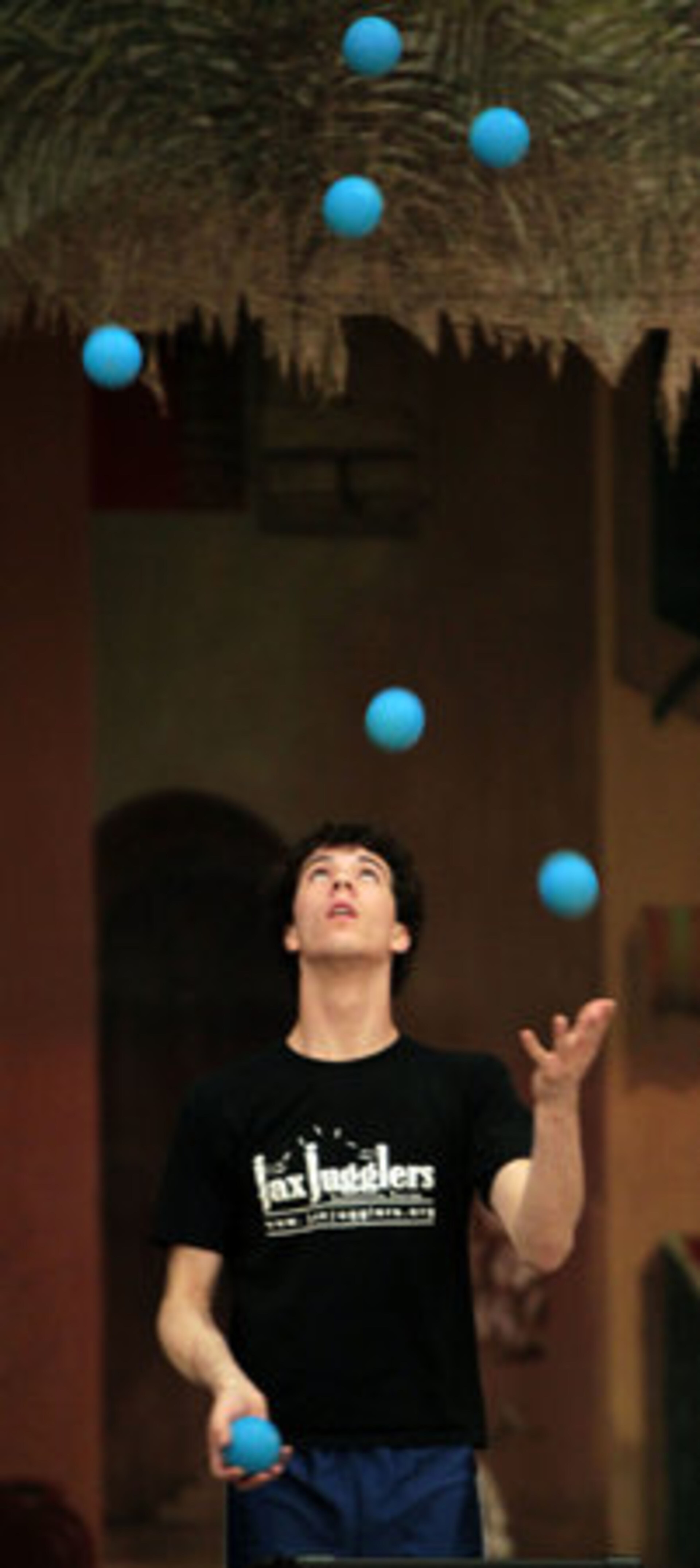 David Ferman, 16, of Jacksonville, Fla., practices during his sixth trip to the Groundhog Day Jugglers Festival. More than half the jugglers at the event are from outside Georgia.