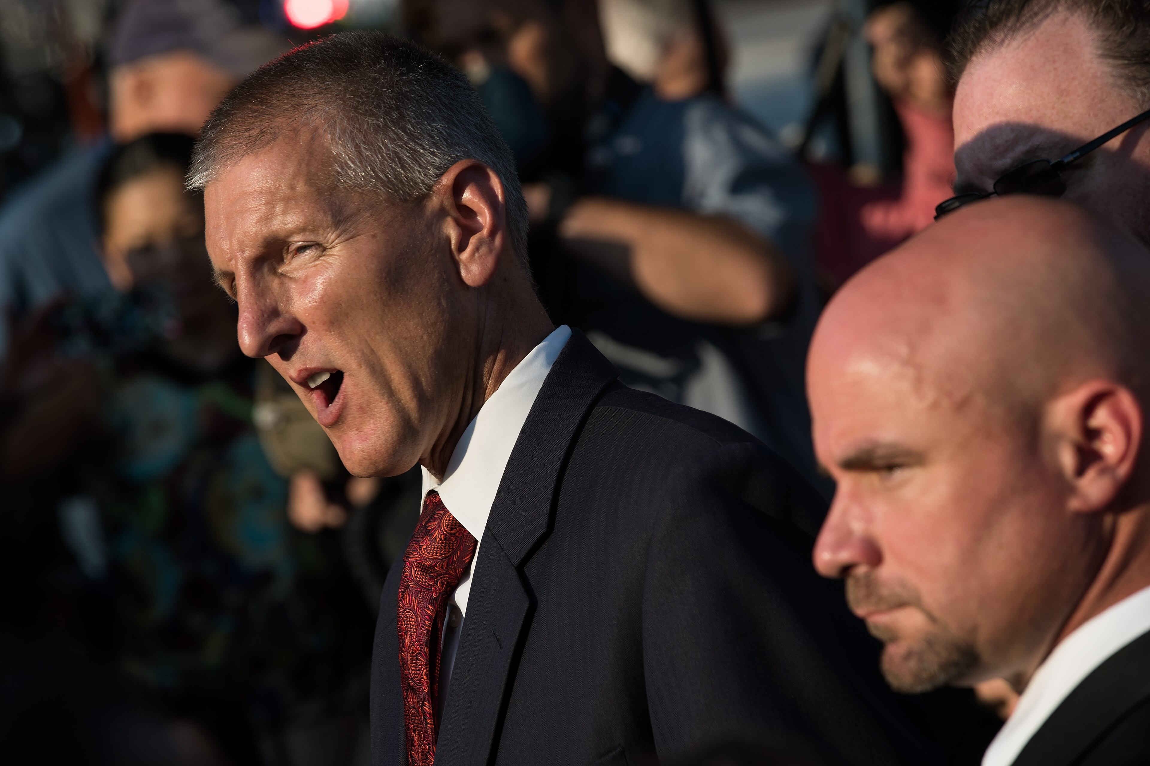 Paul Wysopal, Federal Bureau of Investigation (FBI) special agent in charge of the Tampa Division, speaks as Ron Hopper, Federal Bureau of Investigation (FBI) assistant special agent in charge of the Tampa Division, looks on during a press conference on South Orange Avenue down the street from Pulse Nightclub, June 13, 2016 in Orlando, Florida. The shooting at Pulse Nightclub, which killed 49 people and injured 53, is the worst mass-shooting event in American history. (Photo by Drew Angerer/Getty Images)