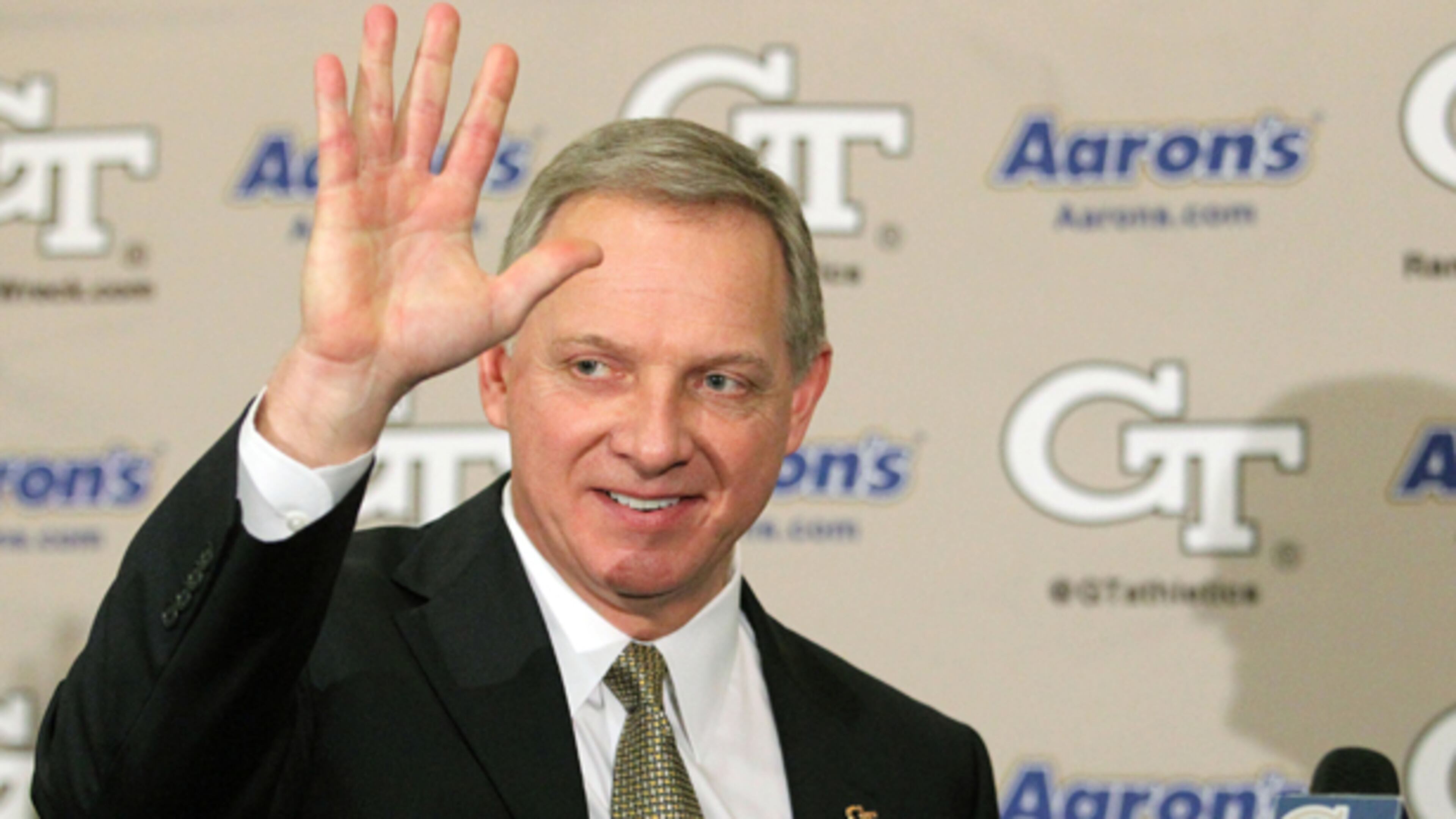 January 18, 2013 - Atlanta, Ga: New Georgia Tech Athletic Director Mike Bobinski waves after he spoke during a press conference at the Edge Building on the Georgia Tech campus Friday morning in Atlanta, Ga., January 18, 2013. Bobinski was the Athletic Director of Xavier University. JASON GETZ / JGETZ@AJC.COM Mike Bobinski hasn't yet waved goodbye to his basketball coach. (Jason Getz/AJC)