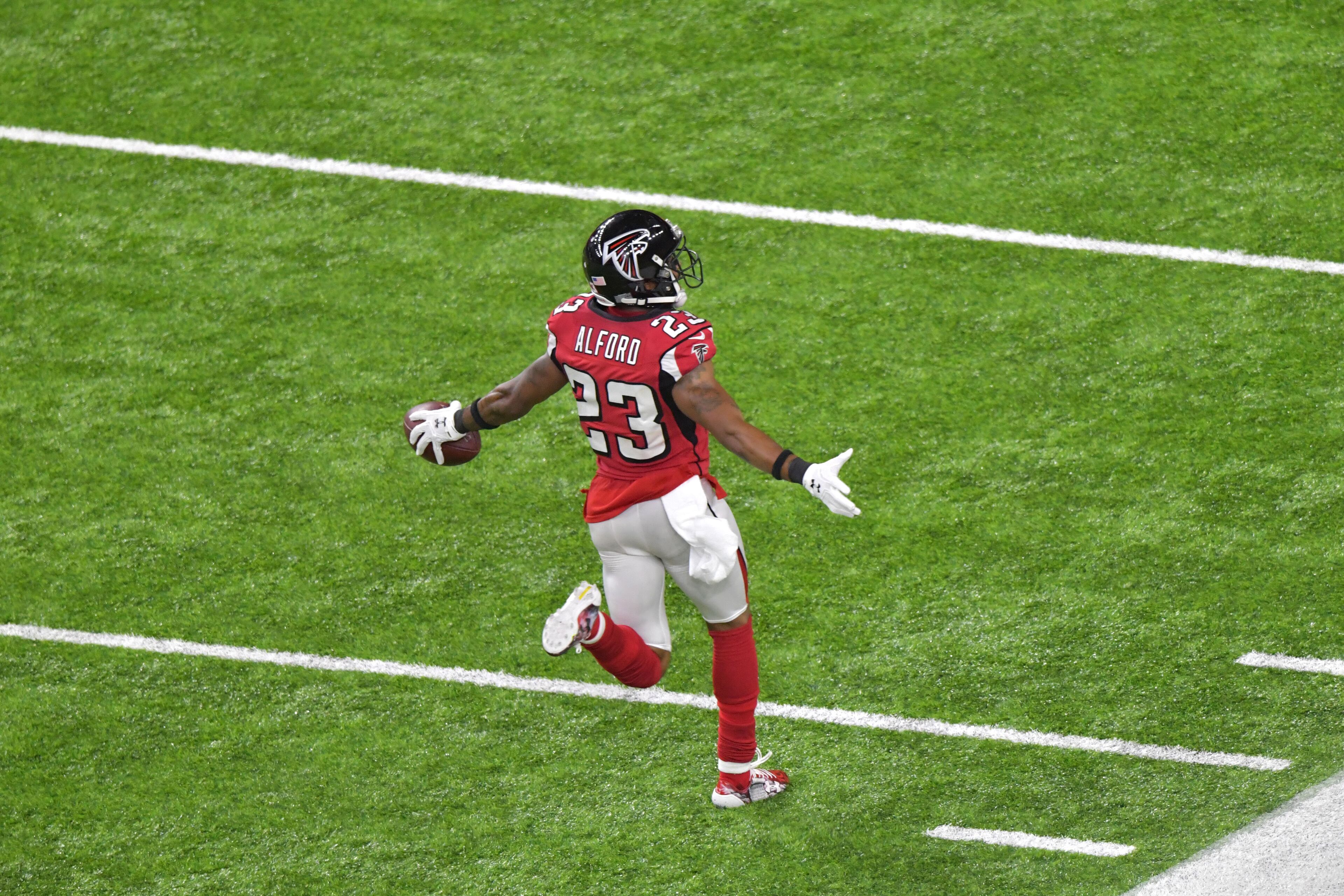 February 5, 2017 Houston, TX - Atlanta Falcons cornerback Robert Alford (23) celebrates as he scores a touchdown in the first half at NRG Stadium in Houston, TX, on Sunday, February 5, 2017. The Patriots beat the Falcons in OT 34-28. HYOSUB SHIN / HSHIN@AJC.COM
