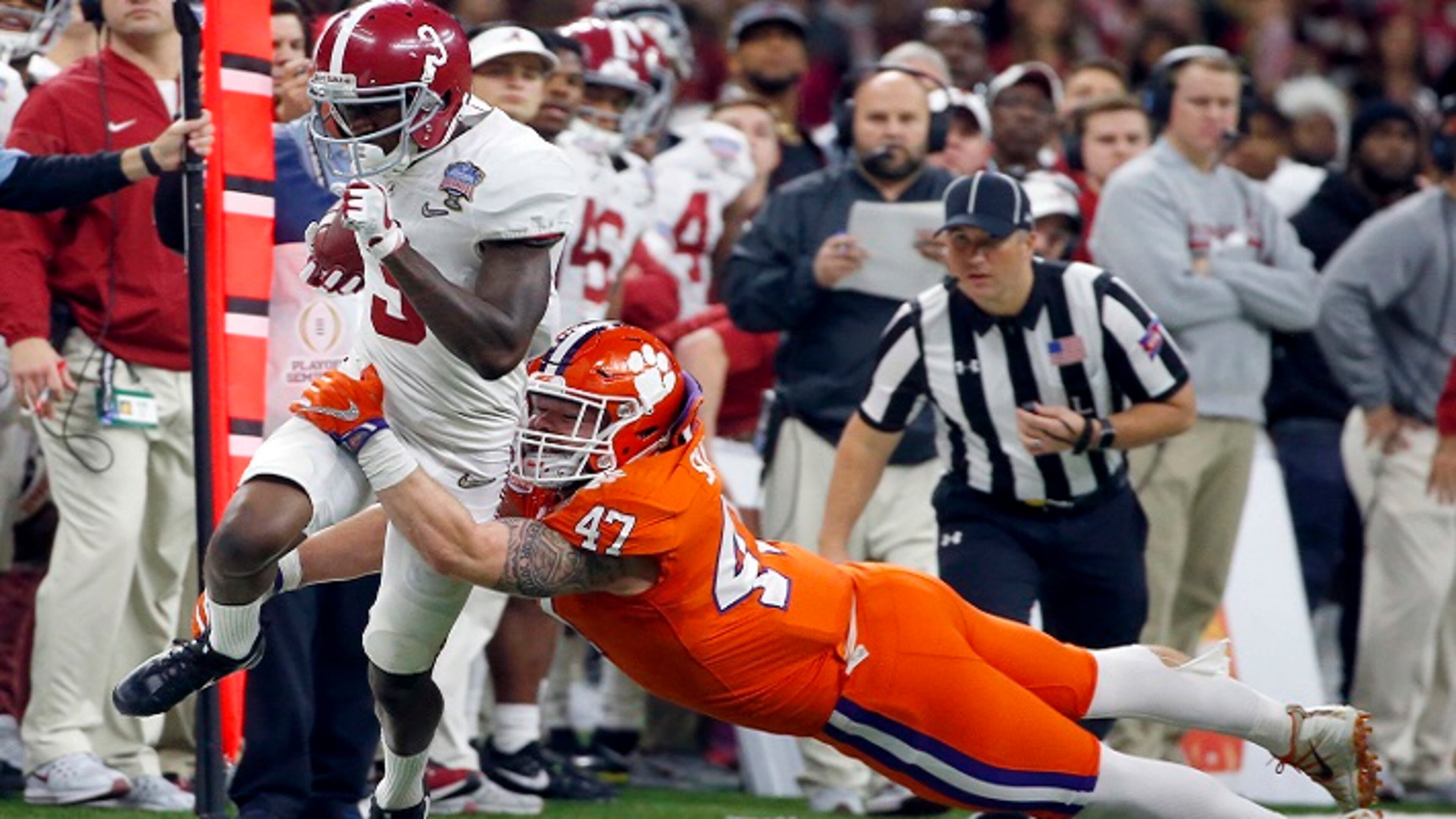 FILE - In this Monday, Jan. 1, 2018, file photo, Alabama wide receiver Calvin Ridley (3) is tackled by Clemson linebacker James Skalski (47) in the first half of the Sugar Bowl NCAA college football game in New Orleans. Ridley is a likely first-round NFL draft pick regarded as one of the nation's best at his position, but you might not have noticed watching the fourth-ranked Crimson Tide's last couple of games. Georgiaâs Javon Wims and Terry Godwin have yielded much of the spotlight to the Bulldogs heralded tailbacks also going into the Monday, Jan. 8, 2018, College Football national championship game. (AP Photo/Butch Dill, File)