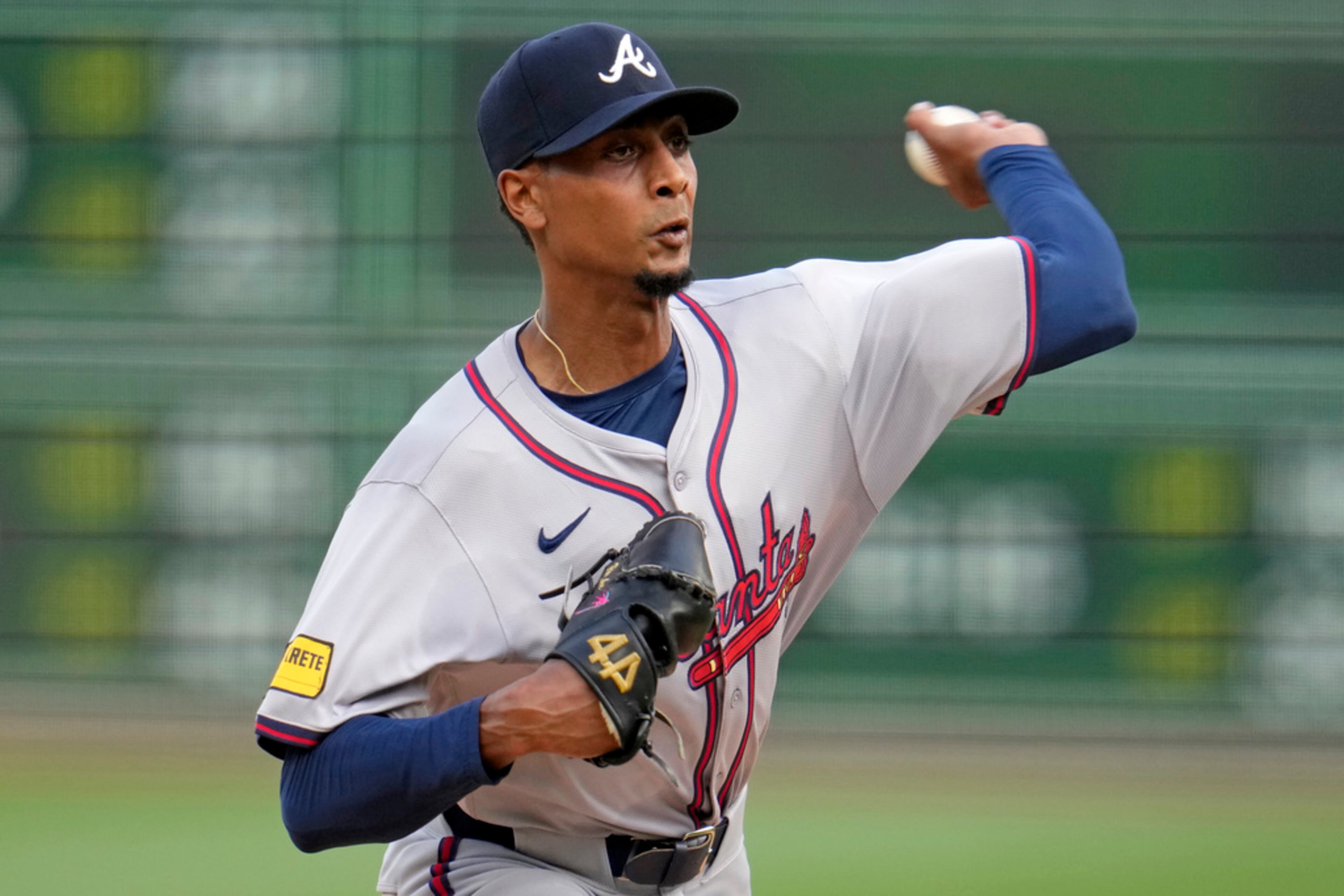Atlanta Braves starting pitcher Ray Kerr delivers during the first inning of a baseball game against the Pittsburgh Pirates in Pittsburgh, Friday, May 24, 2024. (AP Photo/Gene J. Puskar)
