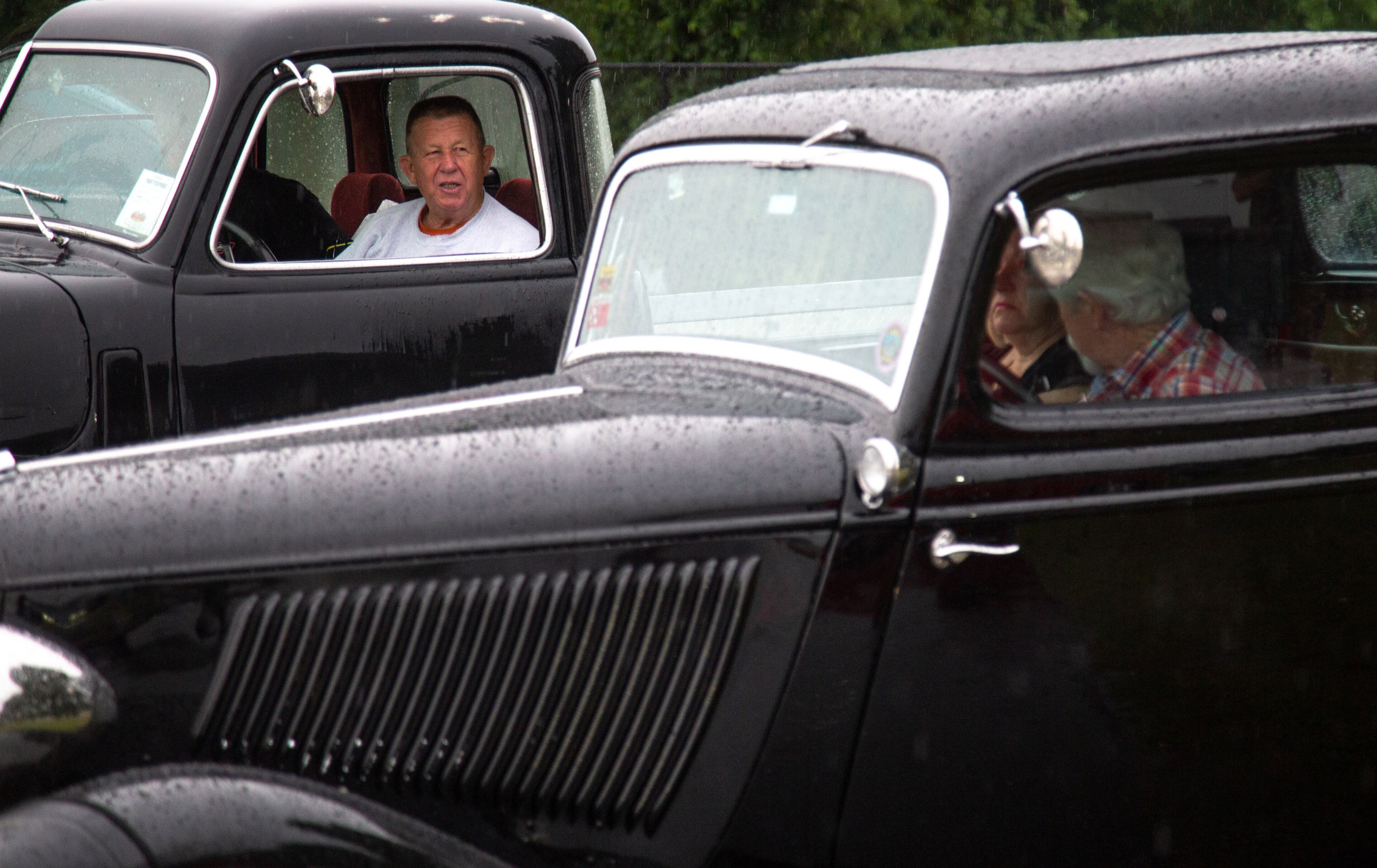 Ronald Stevenson talks with other Creepers Car Club members in his 1948 Chevy pickup truck during the Creepers Car Club’s 29th annual charity show in Marietta on Sunday, June 8, 2019. STEVE SCHAEFER / SPECIAL TO THE AJC
