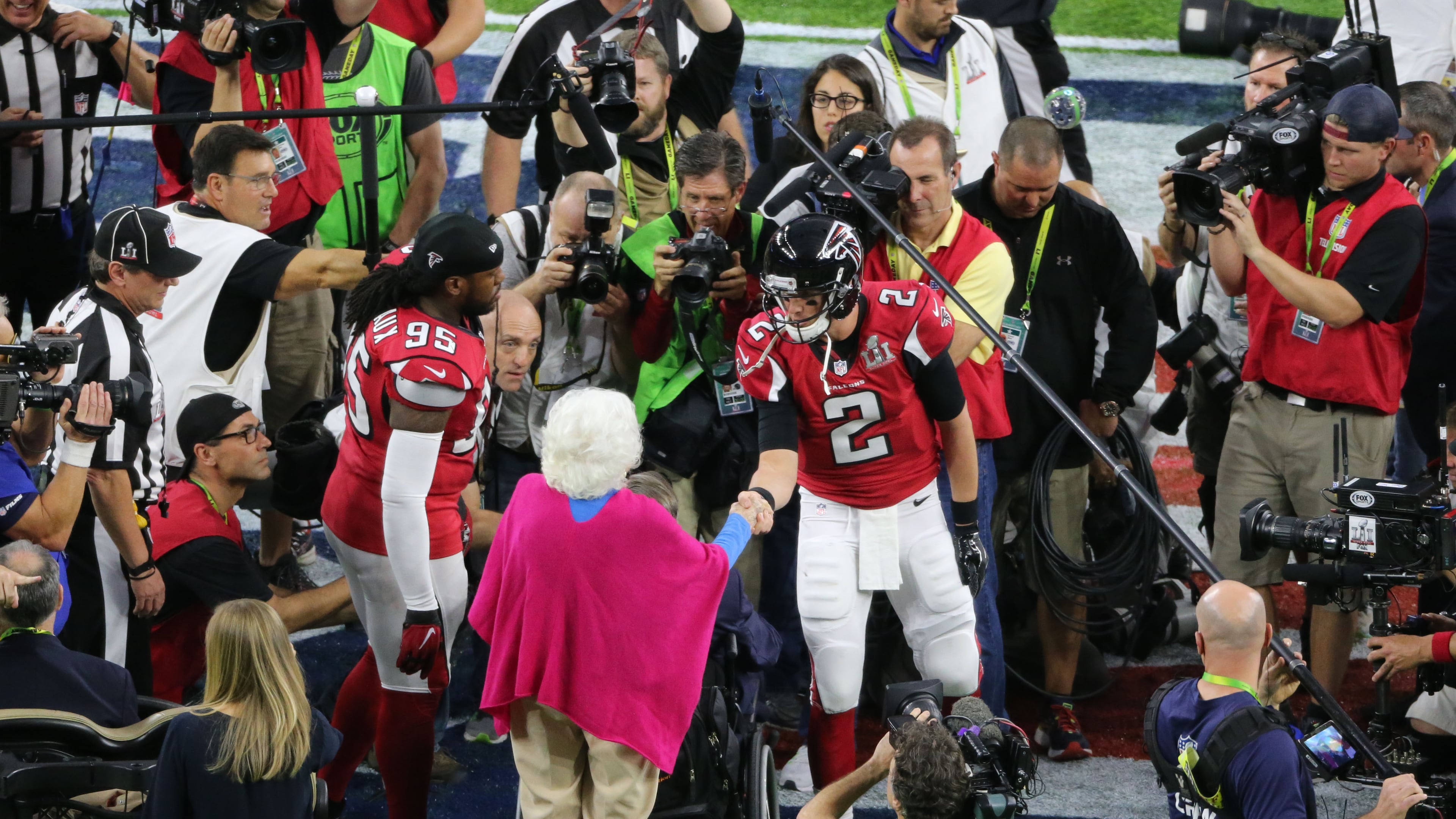 FEBRUARY 5, 2017 HOUSTON TX Barbara Bush shakes hands with Atlanta Falcons quarterback Matt Ryan (2) as the Atlanta Falcons meet the New England Patriots in Super Bowl LI at NRG Stadium in Houston, TX, Sunday, February 5, 2017. John Spink/AJC