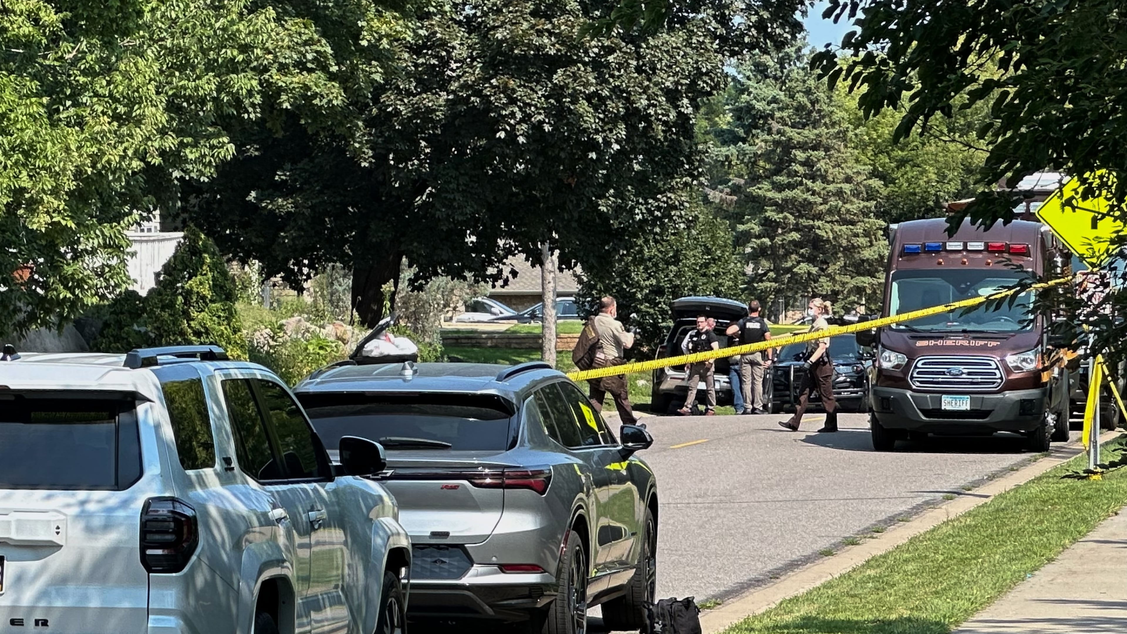 Law enforcement respond to a call at a home daycare, Wednesday, Aug. 12, 2026, in Hopkins, Minn. (AP Photo/Mark Vancleave)
